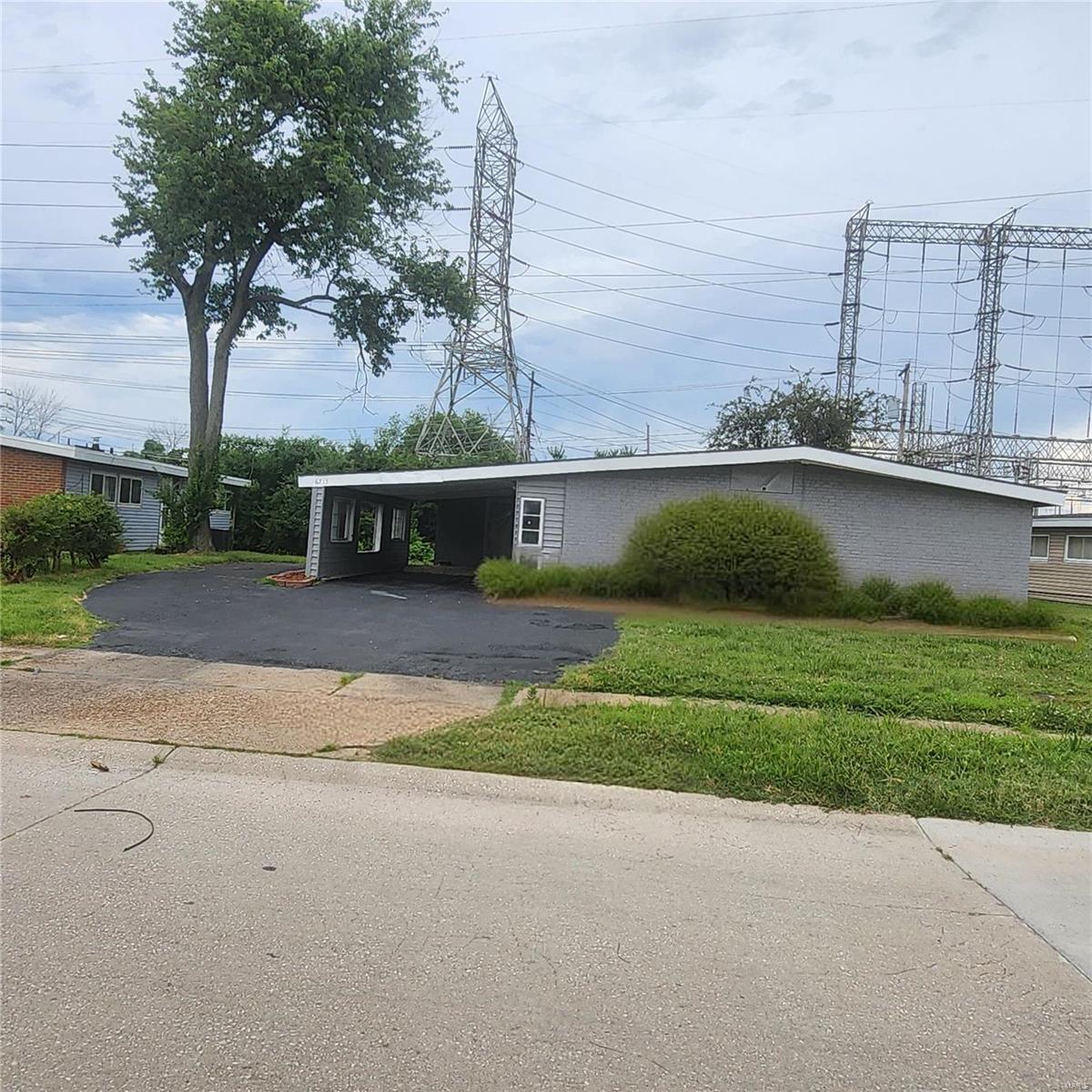 Seller Will Pay Up to $2000 Towards Buyers Closing Costs. This home has been completely renovated and is ready for you to start creating lasting memories!  Once inside, the spaciousness will surprise you!  it offers 4 bedrooms, 1.5 bathrooms, a large living room, a separate family room, and an office or playroom area.  The eat-in kitchen has new laminate flooring, new custom cabinets and countertops, and stainless appliances.  There's also a separate dining room just off the kitchen which is perfect for entertaining.  It's been freshly painted throughout, new light fixtures & ceiling fans installed and new carpet in the bedrooms.  The a/c unit and water heater were recently updated and replaced as well.  Close to major highways and not far from shops and restaurants.  The seller will provide cleared occupancy, but is selling "as-is."