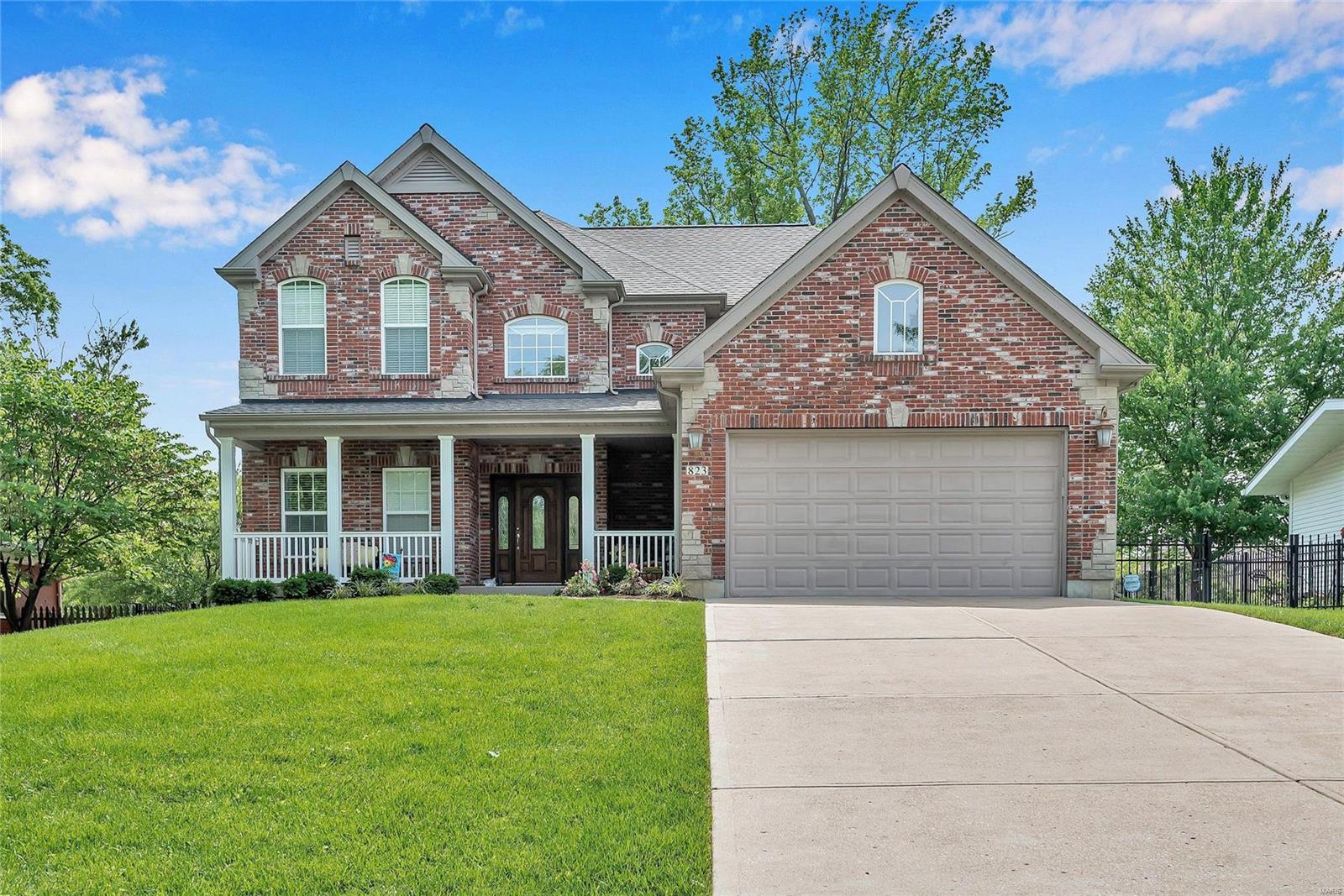 GORGEOUS custom built 2-story on private, level, fenced lot in Ladue Schools. Wood flooring through most of home w/9ft main & upper level ceilings. Property backs to newer development & enjoys a large slider door off kitchen opening to private deck (30X16) for morning coffee or afternoon wine in privacy. Kitchen boasts 42" maple cabinetry, ceramic tile flooring, breakfast area, center island, granite counters & SS appliances. Family Rm w/gas FP & wall of windows overlooks backyard. DR w/coffered ceiling welcomes family gatherings or private dinners w/friends. Den/office space is a necessity for work or schooling in today's environment. 4 large bedrooms on 2nd level w/master suite including his/her closets, Over-sized shower, whirlpool tub & double sinks. 3 bedrooms w/walk-in closets, one full Jack 'N Jill bath plus one additional en suite w/full bath. Unfinished LL w/rough-in. Sprinkler system, 2-car garage & large main fl laundry. ROOF NEW IN 2019. Next best thing to new construction!