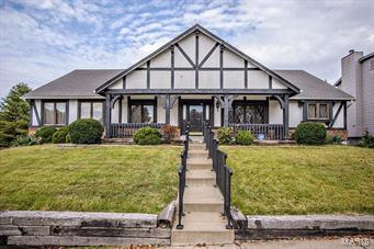 Lots of potential in this 2000 square foot ranch. Nice open floor plan with full brick masonry gas fireplace with room heating in the vaulted great room. There are two sliding doors which lead to a nice size covered deck. The kitchen has white counters, a secretary desk, smooth cook top, double oven, a pantry and microwave. The laundry is on the main level in the hall, and the house has a central vac system. Master bedroom has a walk-in closet as well as another sliding door closet. The bathroom has lots of counter space, tub and separate shower. The basement is a walkout with a 20X12 workroom, and is a blank canvas ready to be finished. All of the systems are in good working order, The yard is fenced, has very nice landscaping, and a sprinkler system.  There is a huge tuck-under 4 car (2 car tandem) garage and a big parking pad for more cars if needed. So much potential, just needs some updating!
