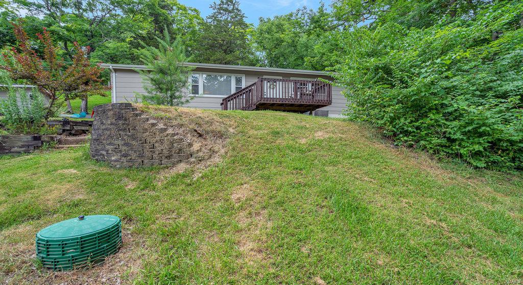 Welcome home to your quiet retreat in paradise. Nestled on 2.73 acres of private wooded land and yet close to all of the city amenities that you need and love. Step inside and be greeted by an inviting dining room and newly renovated kitchen complete with stainless steel appliances and shaker custom cabinets. The family room is the perfect place for family nights with a vaulted ceiling and large windows flanking the gorgeous woodburning fireplace. The master bedroom is a true oasis with updated ensuite including vanity and walk-in shower. 3 additional bedrooms and 1 additional full bath, plus large mudroom gives you all you need to settle in and make memories in your new home.