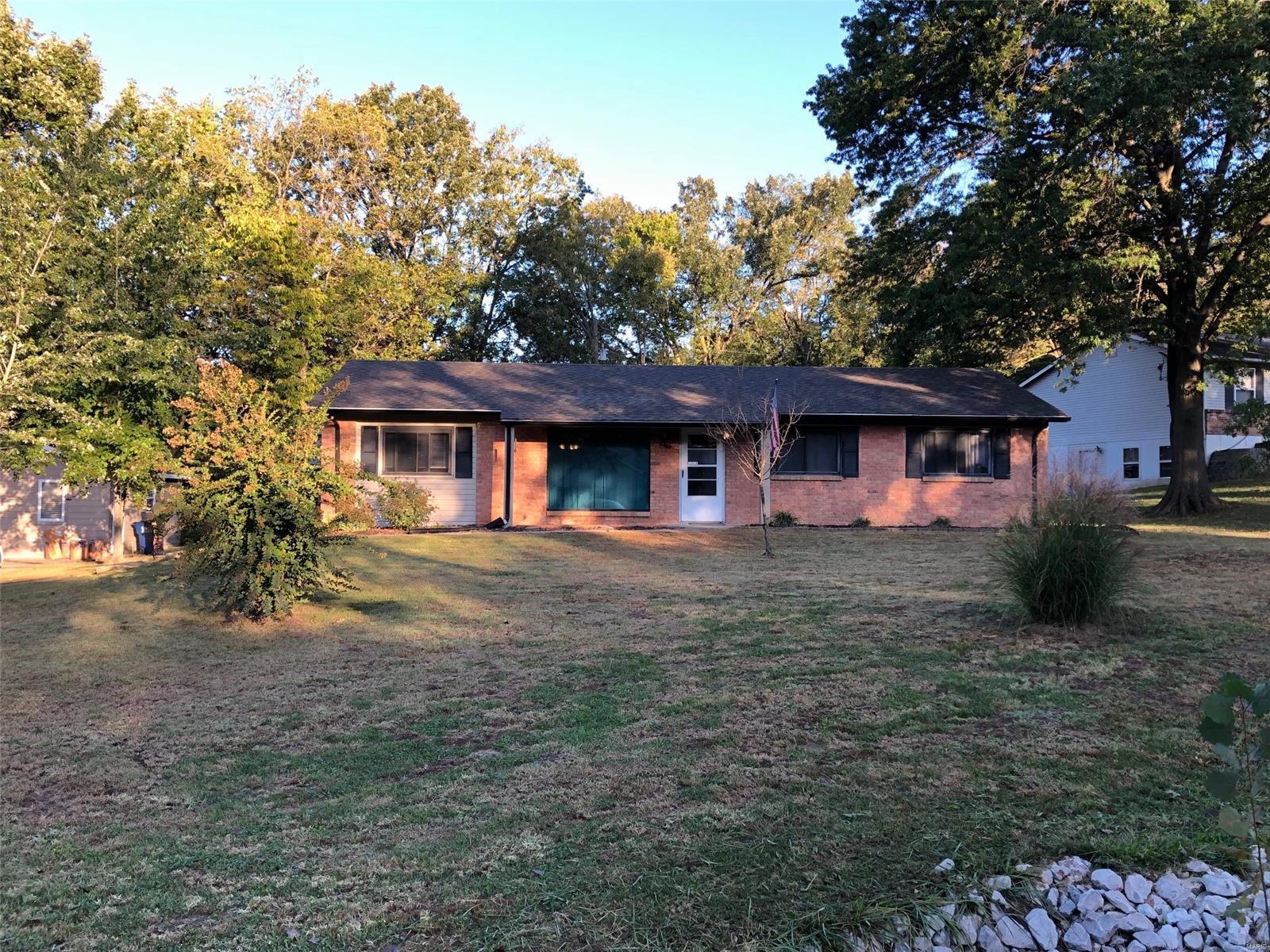 Beautiful 4 BEDROOM, 2 Bath Ranch in a great O'Fallon location! Home has newer Stainless Steel Appliances, new Heat Pump, updated bathrooms, and has been completely painted! The home has a wide open floor plan so the sky's the limit for arranging furniture! Laundry room is huge and is conveiniently located on the MAIN floor. The huge yard backs to trees, and the lot is on a dead end road, so there is plently of privacy and room to entertain! The detached garage is an oversized 1 car (possibly 2). There is an extra storage shed, along with a lean-to for mower, etc. Don't miss out on this rare find in St. Charles County!
