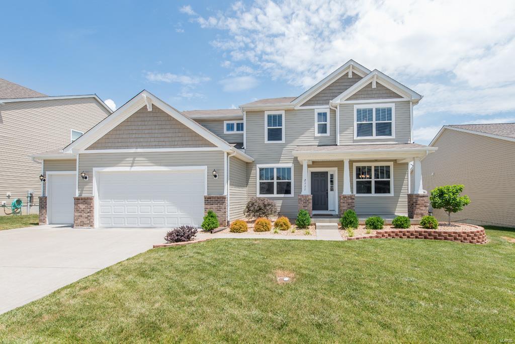 Find contemporary sophistication in this masterpiece with an open-floor plan & luxurious features throughout, conveniently located close to I-364. The home boasts a craftsman styling with a traditional front porch; in the back, find a 600 SF aggregate patio that's perfect outdoor living. A striking Foyer opens into the equally stunning two-story Great Room. Radiating elegance, enjoy luxurious large format porcelain tile throughout the entire main floor. The open-concept Kitchen boasts 42'' maple cabinets, granite tile countertops, travertine backsplash, stacked stone island, and stainless steel appliances. Main-floor master suite is an oasis with bay window seat and trey ceiling. The massive upstairs Media Room has custom built-in cabinetry spanning the length of the room and crown moulding with rope lighting. In the elegantly-finished lower level, find 850+SF of living space: 9' pour, Rec Room, Bath, and 5th Bedroom. Seller installing wet bar. Enjoy Preston Woods pool & playground.