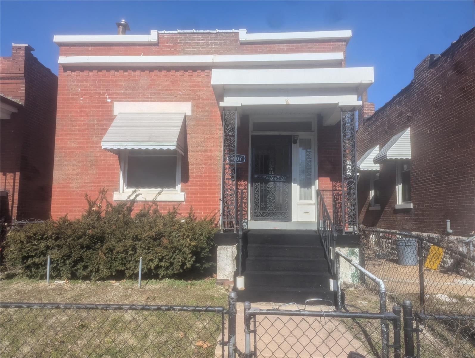 STARTER HOME -OR- INVESTOR PROPERTY. This brick home is move in ready. Hardwood floors through-out with ceiling fans. Updated kitchen which includes stove and refrigerator. Home is sold AS-IS condition. Put this on your list to view before you miss out. Invest in this move in ready property and add it to your portfolio! PRICE FOR QUICK SALE!