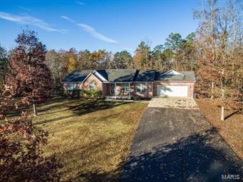 Foxwood Pointe!!  Nestled down a private drive in the very desirable Foxwood Pointe subdivision is your 5 bedroom, 3 full bath home on 3.09 acres.  Home features hardwood flooring, oversized bedrooms, walk in closets, jacuzzi tub, safe room, and 2 car attached garage.  Call today this one will not last long!