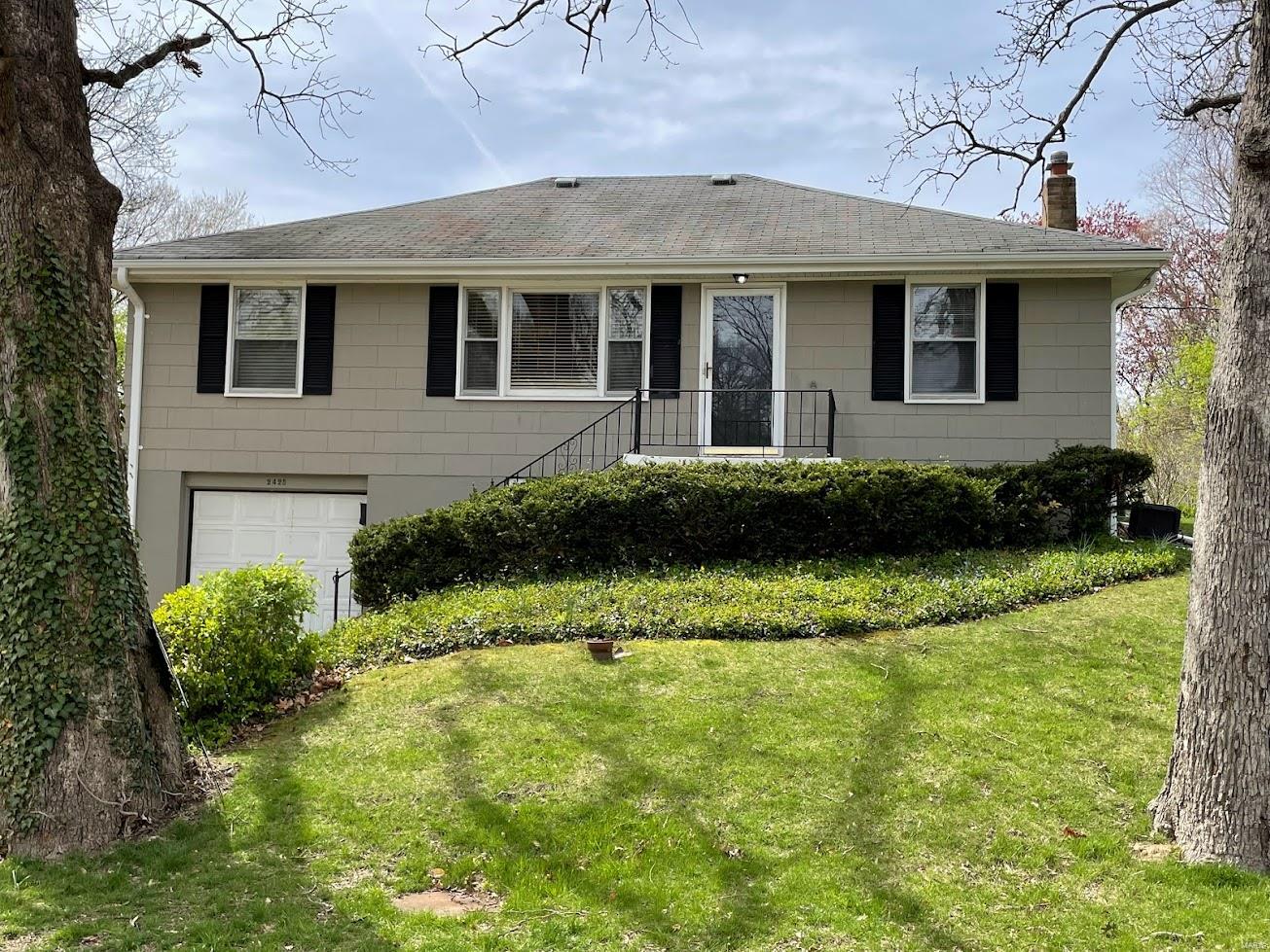 Attractive bungalow on a large, private feeling lot with inground sprinkler system, large patio with masonry wall, & plenty of space to build an addition or a pool and still have an amazing backyard!  Neighboring homes on each side are set back giving this home an even more private feel. Situated on a quiet street in Webster Schools within walking distance to Tilles Park and Brentwood shops, it’s just a two-minute drive to Highway 64/40 or 170 and a five-minute drive to Clayton or Frontenac.  The main floor features an updated kitchen with granite and stainless, an updated bath, separate dining room, and three bedrooms.  The jaw-dropping entertainment area on lower level has an incredibly unique, beautifully designed terrazzo floor and full terrazzo bar!  Lower level also includes another 3/4 bath and a separate laundry area.  Additional features - double width driveway, oversized tuck-under garage with work area, and full staircase to the attic for extra storage.