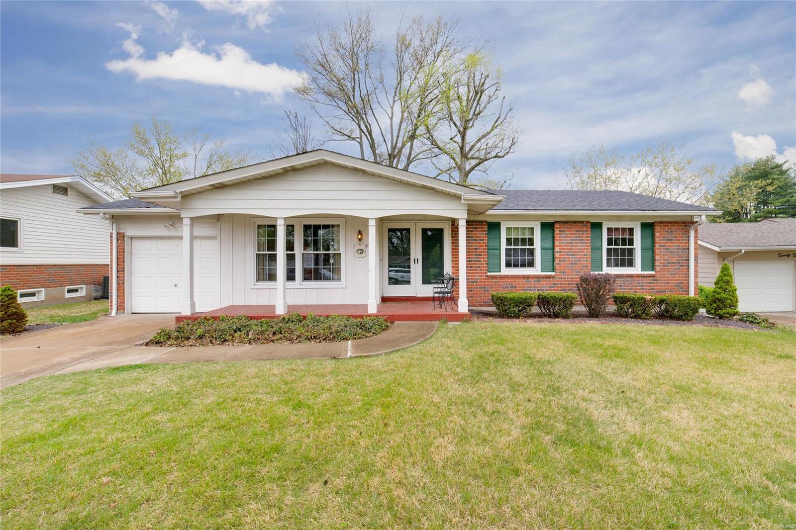 Meticulous 1 Owner Home with 1700 sq ft of Living Space - You can't miss how much these sellers have loved this home. Notice the Great Curb Appeal, Covered Front Porch,  Vinyl Windows and the Low Maintenance Exterior! Welcome your Family/Friends into the large foyer flanked by the formal Living Rm/Dining Rm Combo or Main Floor Family Room, Lots of Natural Light and Original Wood Floors under the Carpets, Perfect! Enter into the Large Eat-in Kitchen with Custom Cabinets, Pantry, Gas Stove & Wall Oven/Microwave! Look out the Kitchen Window and notice the serene level backyard, with Patio, Large Trees and Shed! Perfect. There are 3 Bedrooms & 2 Full Bath. The Master Suite includes a Full Bath - All 3 Bedrooms have Original Wood Floors, Beautiful.  Need More Space, the Finished Lower Level is finished for Entertaining, Relaxing and Family Time! Home has Already Passed all St. Louis County Inspections and is Ready for a Quick Close! Homes like this don't hit the Market often, Don't Miss it!