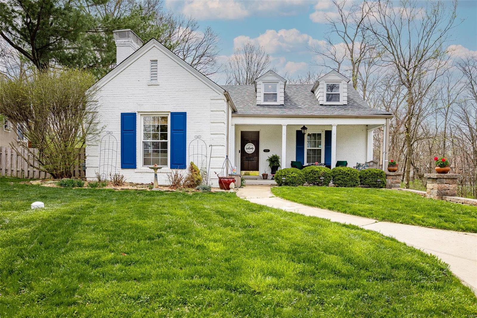 Welcome home to your new charming Kirkwood cottage! As you walk through the front door you'll notice the stunning hardwood floors, large living room w/ a cozy fireplace, built in bookshelves & open concept living! The flow from your living room to your huge dining room & updated kitchen is perfect for entertaining! In the kitchen you'll find custom cabinets, quartz countertops & stainless steel appliances! Walk down the hall to your two spacious bedrooms & updated full bath! Head upstairs to another living space with a  bedroom, half bath & TONS of storage! The basement is partially finished with a generous laundry room & a workout room perfect for a home gym. Make your way out to your screened in porch off of the kitchen which overlooks the amazing backyard perfect for those summer BBQs! Don't forget the one car tuck-under garage for easy access to your home! Within walking distance to Kirkwood High School & VERY walkable location! Professional photos will be coming soon! Additional Rooms: Sun Room
