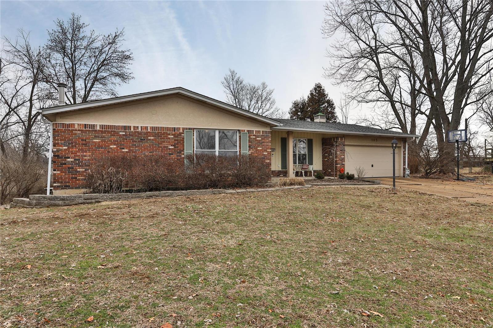 Sprawling 3 bed 3 bath ranch in the Gateway Estates subdivision sitting on over a half acre of land and boasting well over 2,000+ sqft of living space. Long driveway leads into the 2 car garage, perfect for unloading groceries! OR enter through the front door into the entry foyer where you're greeted with freshly painted walls, custom woodwork, and pristine wood flooring. Upfront features a spacious family room with tons of natural light and a lovely dining room that overlooks the large front yard. Kitchen features a plethora of countertops and cabinets, not to mention a breakfast bar! Living room adds another element of living space on the main level. Master bedroom has double sliding closets and full bath. Other two bedrooms are sized nicely w/wood floors. Both are serviced by a hall full bath. LL is finished w/walkout and storage area. Large rec room w/new carpet, sitting room and full bath. Bonus room off back of garage could function in many ways, heated and cooled. Huge yard!