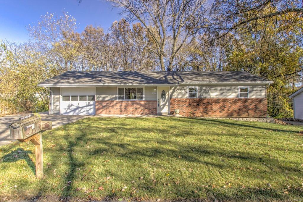 Incredibly close-in St. Charles location!  Surrounded by mature trees & woods, this affordable 4-bedroom ranch in the Boone Hills neighborhood is instantly accessible to Hwy. 94 & I-70.  The main level features a family room, generous kitchen/breakfast room combination, three bedrooms & a full bath.  On the walk-out lower level, a recreation room, fourth bedroom & another full bath provide additional entertainment & privacy space.  Noteworthy finishes include special millwork; custom cabinetry; carpeting, wood & ceramic tile flooring; 6-panel & French doors; & a fully-equipped kitchen with solid-surface countertops, dishwasher, disposal, microwave, gas range/oven & refrigerator.  Adding still more value… a sundeck, attached garage, utility shed & partially fenced yard.  Great location, great price & top-ranked Francis Howell schools!