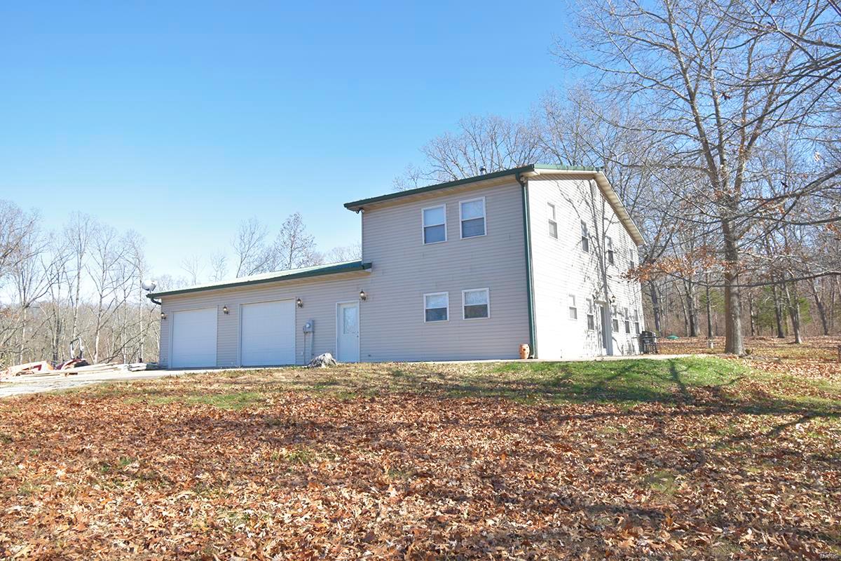 Looking to get away from the hustle and bustle?  This is the privacy you are looking for.  This updated, well maintained, 3 bedroom, 2 bath, 2 story home is located on 114 acres and boasts a spacious open floor plan.  The large eat in kitchen opens into the family room and contains a gas range/oven, microwave over the stove, and a dishwasher.  The home's wood stoves help keep the utility costs low in the winter.  The second floor bedrooms are separated by a large bonus space.  There is an oversized attached garage that you have to see to believe.  The land has endless possibilities and you can spend countless hours exploring the springs, creek, pond, woods, and fields.