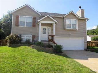 This 3 bdrm /2 full bath home located on cul-de-sac shows true pride of ownership! The freshly painted Great Room w vaulted ceiling boasts newer laminate flooring & wood fireplace. The open floor plan makes entertaining a breeze - the Great Room flows into the dining area & kitchen where updts include ceramic tile flooring, newer microwave & dishwasher. A large newly constructed deck off dining rm is great for outdoor living! The mstr bdrm has large walk in closet. The full bath on main level has nice updates too! You will be impressed with the size of the finished LL that serves as the third bdrm. The full bath in the LL has been completely remodeled & includes beautiful ceramic tiled shower. The level back yard is fenced. The oversized two car garage has plenty of room for storage and/or workshop area. Sellers have given attention to detail; newer front door w/porch railings, 6 panel doors w/brushed nickel lever handles, newer shutters, fresh paint & new carpeting 6/16. HPP included.