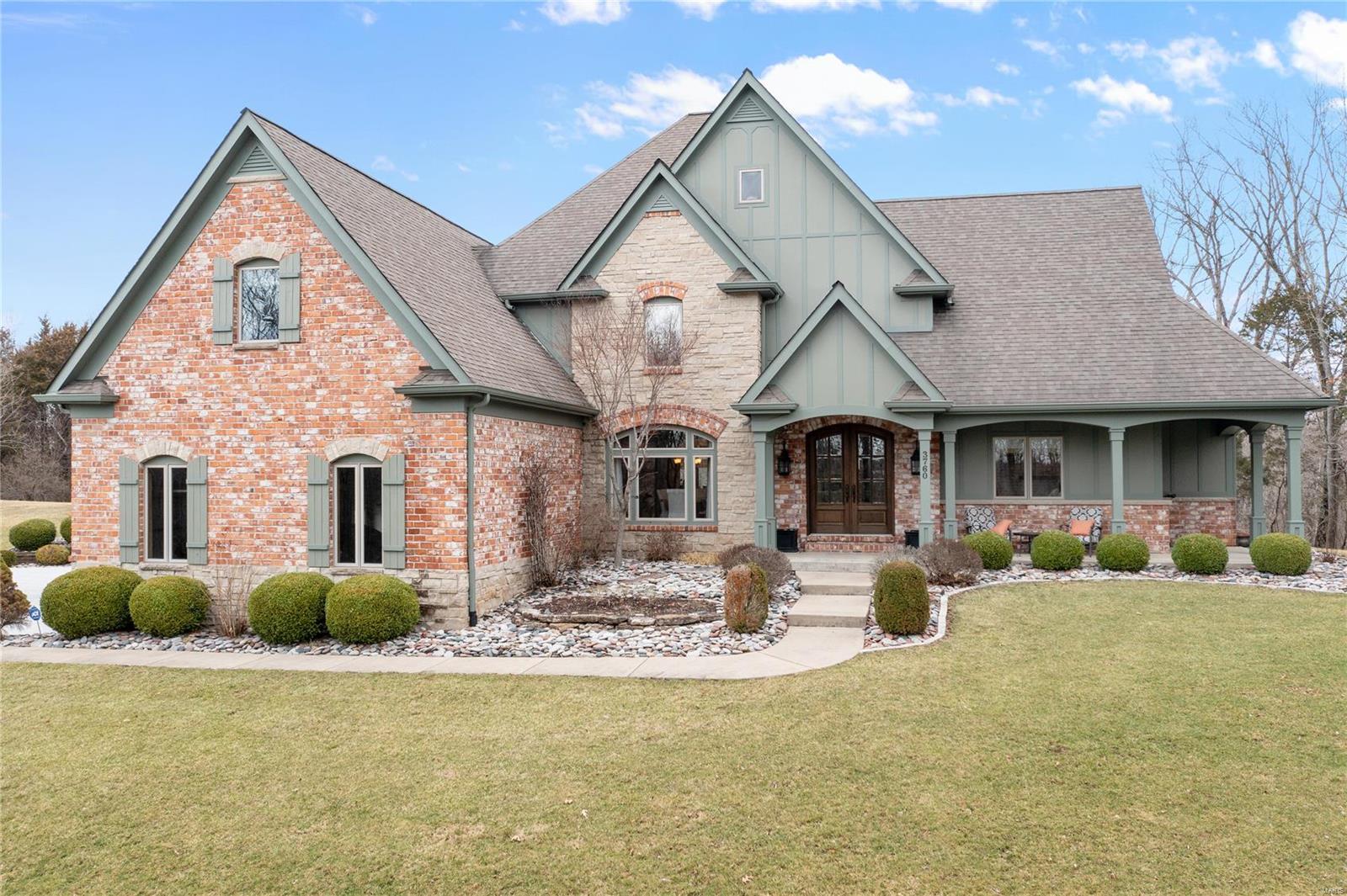 Look no further! This custom-built 1.5 story sits on a beautiful 5 acre lot with an inground pool and tons of privacy. Quality finishes throughout! Custom mahogany front door and 2 story entry with a sweeping staircase and tile floors. Formal dining rm with crown molding. Incredible 2 story great rm with a stone fireplace, custom windows, and millwork. The lovely kitchen boast custom cabinets, a center island with a breakfast bar, built-in refrigerator, Wolf gas range, beverage chiller, an adjoining breakfast rm and vaulted hearth rm with a fireplace and built-ins. ML master suite with 2 walk-in closets and full luxury bath with double vanities, jetted tub and walk-in shower. 3 additional bedrms, 3 full baths and a bonus rm on the UL. The walk-out LL, with roughed in plumbing, is ready for your finishing touches. Additional features include ML laundry, 2 ML half baths, composite decking, patios, level yard space, 3 car side entry garage and much more. Absolutely charming!