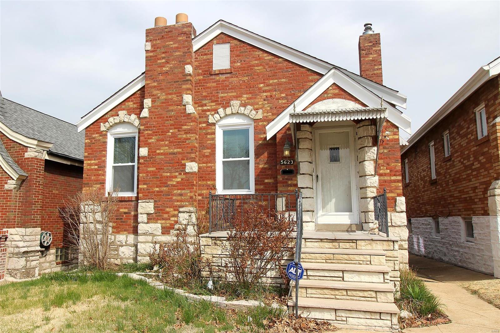 What a Beautiful stone and brick Bungalow Home is located in the middle of the great restaurants, shopping, cafe,bar and park! As you Enter through original front door with art glass into your separate foyer with  stained glass window on right, with coat closet door.Through an arched opening you will find a large living and dining room complete with gleaming hardwood floors, stain glass,  stained woodwork and neutral paint. The spacious Kitchen just off the formal dining room, updated  kitchen cabinets, nice counter tops, appliances, ceiling fan and the Refrigerator stay. The glass enclosed back porch is perfect for entertaining.  the two bedrooms has a ceiling fans with complate original  hardwoods, neutral paint. nice and bright updated bathroom.well maintained Home has a newer roof, some newer windows,newer HVAC and more! Basement has  a sleeping / office area and storage room. A level , fully fenced yard with 1 car garage is  "AS IS ".  Get there and make it yours today ! Additional Rooms: Sun Room