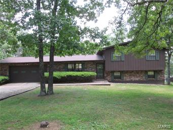 Great home in the country!  This tri-level home has three bedrooms and two bathrooms.  There is a family room, utility room and additional storage in the lower level as well as the second bathroom. The family room boasts an all brick wood burning fireplace.  This home has been very well cared for.  There is a newer roof as well as furnace/central air unit.  Buyer is being offered a one year home warranty.  The large back yard has an above ground swimming pool with a nice deck and is fenced with a chain link fence.  There is also a nice detached garage (approximately 24x34).  The large shaded lot is 1.78 +/- acres and is just minutes from city limits.  This one won't last so call today for an appointment.  

Home is being sold "As-Is".
