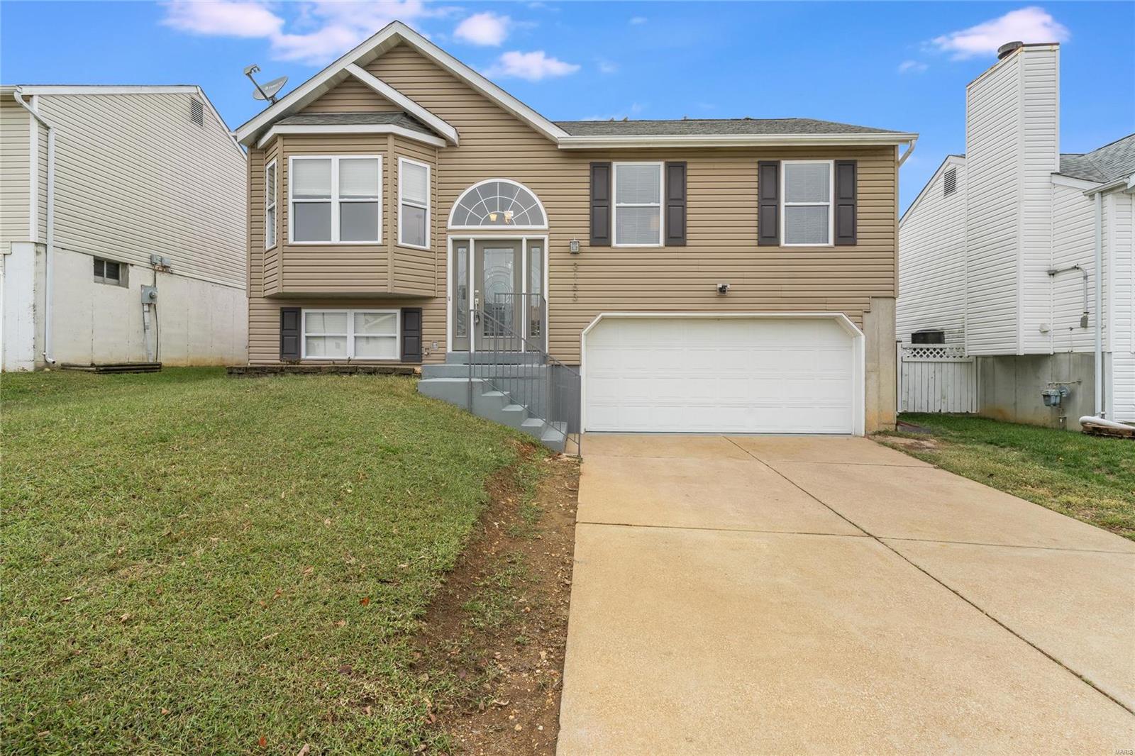 Updated & Move-In Ready! This 3 bedroom, 2.5 bath home is airy with vaulted ceilings, freshly painted neutral walls (2020) & new carpet (2020) throughout the main level! The open floor plan offers a spacious living room with bay window & moves directly to breakfast room. Great space with plenty of natural light, walk right out to the newly painted deck through sliding glass doors from the breakfast room. The kitchen offers plenty of cabinets & large pantry. The hall bathroom has custom title work & glass bowl sink. The master suite is SPACIOUS with bay window & ensuite full bath. 2 auxiliary bedrooms on main level completes the home. The finished lower level offers hardwood floors w/accent border is the perfect space for family room, 4th bedroom, or hobby room. The lower level has ½ bath for convenience & attached 2 car garage! Large fully fenced level yard!