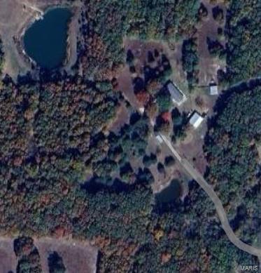 Great 10 acre property with large pond and out-building. Perfect for that hobby farm, or just to get away from it all, but still close to town and amenaties!