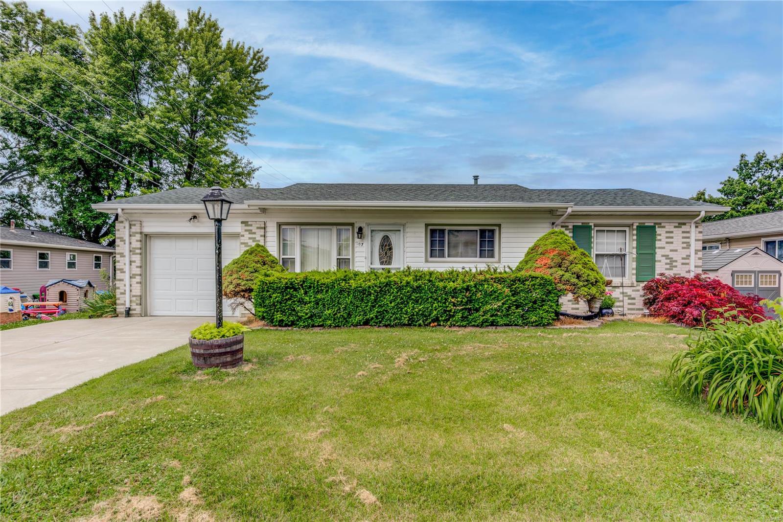 Whether you're looking to move on from apartment life or it's time to downsize, this adorable, well-kept home is waiting for you! Commuting will be a breeze with easy access to 364 and within walking distance to Francis Howell schools. You will have peace of mind knowing the roof and HVAC have been replaced in the last 5 years. With the extra space of finish in the basement and spacious, level yard, you will be ready for those upcoming BBQ's and gatherings. In addition to the attached garage, the driveway has been widened for extra parking space. Stop by for a visit and make 107 Keeney your home today!