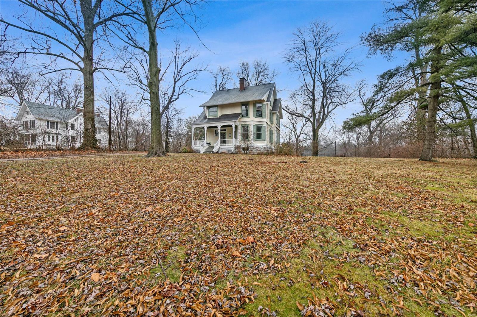 Historically Beautiful!!! Built in 1870 this one of a kind home is located on 2 acres!! An adorable cottage out back with a stove for heat and S'mores while sledding adds to the charm. A spacious front porch warms you as you approach the home. Soaring ceilings greet your entry with a wrapping staircase. To your right through the French Doors is a Grand Room with extraordinary windows and fireplace. The dining room has a traditional feel in need of some candle sticks to match the gas fireplace. Around the kitchen is a butlers staircase. There are 4 rooms on the 2nd level and 2 rooms on the 3rd. Also in the basement is a full bathroom and potential for a sleeping room with the walkout. The 2nd floor is also equipped with laundry and a balcony overlooking all of your land. The timing is Perfect for you to move in and see all the beauty of spring come to life!!!