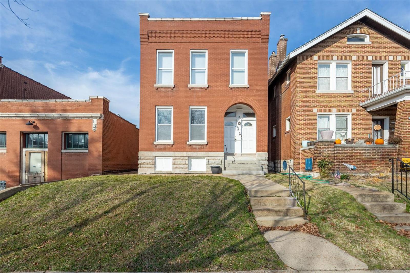 Welcome to this beautiful 2 family in the heart of South City! This 2 family has everything you could want in a building for your tenants or owner occupied 1st floor w/a tenant on the 2nd! New refrigerators (both units), updated appliances, newer electrical panels, water heaters, furnaces, & AC units! Both of these units have beautiful hardwood floors throughout & LARGE kitchens. Second floor unit has 2 bedrooms & a sunroom off of the kitchen. 1st floor unit is a 1 bedroom unit w/ the original pocket doors. Each unit has an updated bathroom & washer/dryer hookups in the basement. Don't miss the newer windows & 2 car parking pad out back! Schedule your showing today!