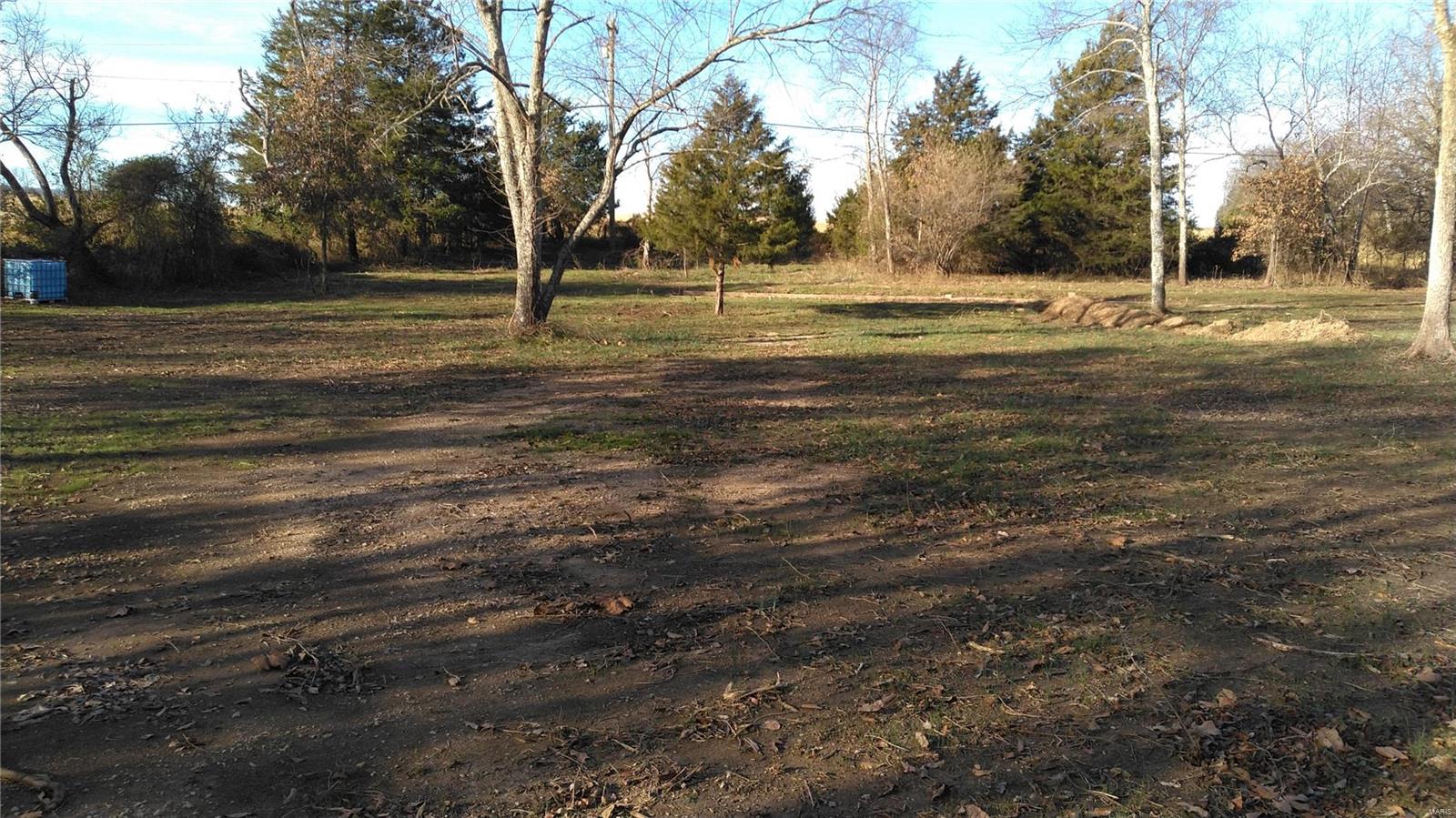 Nice little piece of property with highway 72 and County Rd 535 frontage. Old trailer pad, dug well, septic, and Electric. Mostly Cleared off, left just enough trees for privacy. Would make a great camping spot or home site.