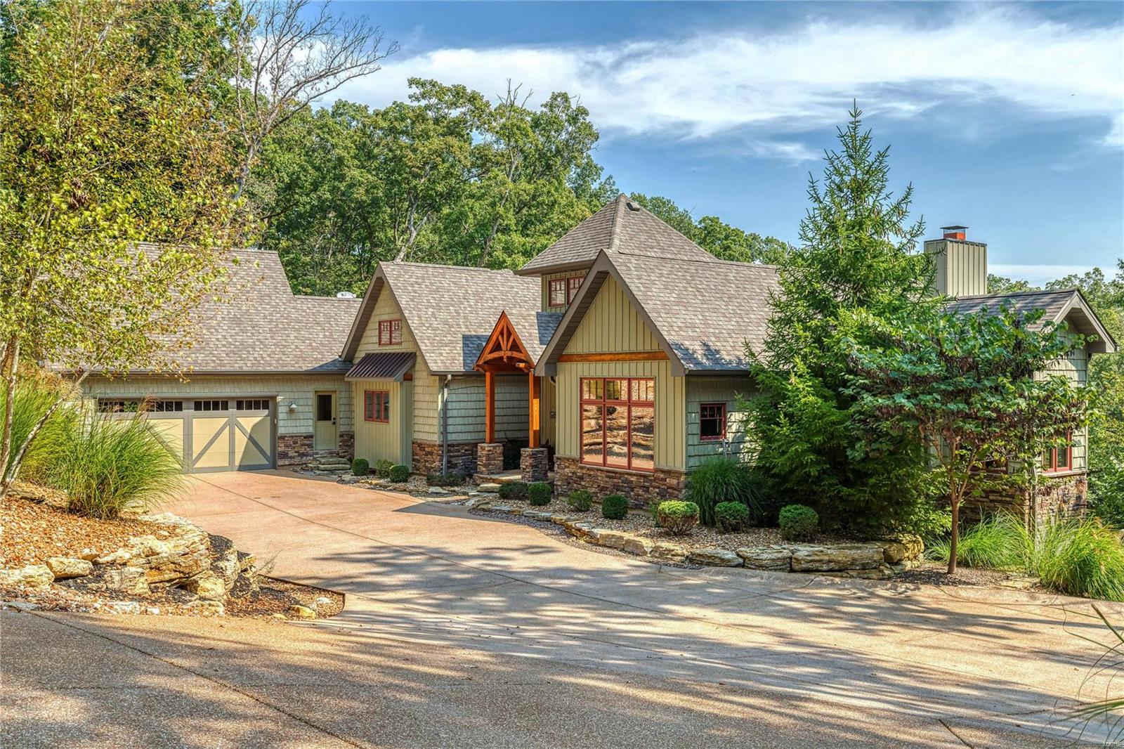Gorgeous views, private setting & a home with no details overlooked--prepare to fall in love with 2333 Alpine Overlook. Right away, you'll know why the owners selected this lot to build their custom home. Overlooking Lake Alpine w/the added plus of a salt water pool, hot tub & lakeside dock/beach area, this home will be the envy of all you entertain. And entertain you will, with beautiful open living spaces with hand-hewned beams by Tuepker Bros, wood floors & full windows that take in the natural setting. Main floor master overlooking the lake w/fireplace for cozy evenings; guest room; gourmet kitchen w/top of the line appliances inc Wolf range, dbl oven, warming drawer, wine fridge & more. Lower level offers 2 en-suite bedrooms, entertaining bar & full recreation room. Enjoy easy-maintenance grounds, perfect for lakeside events. This home has been featured in local publications & has been the site of many a gala. Most furnishings & luxury Duffy boat available for turn-key purchase.