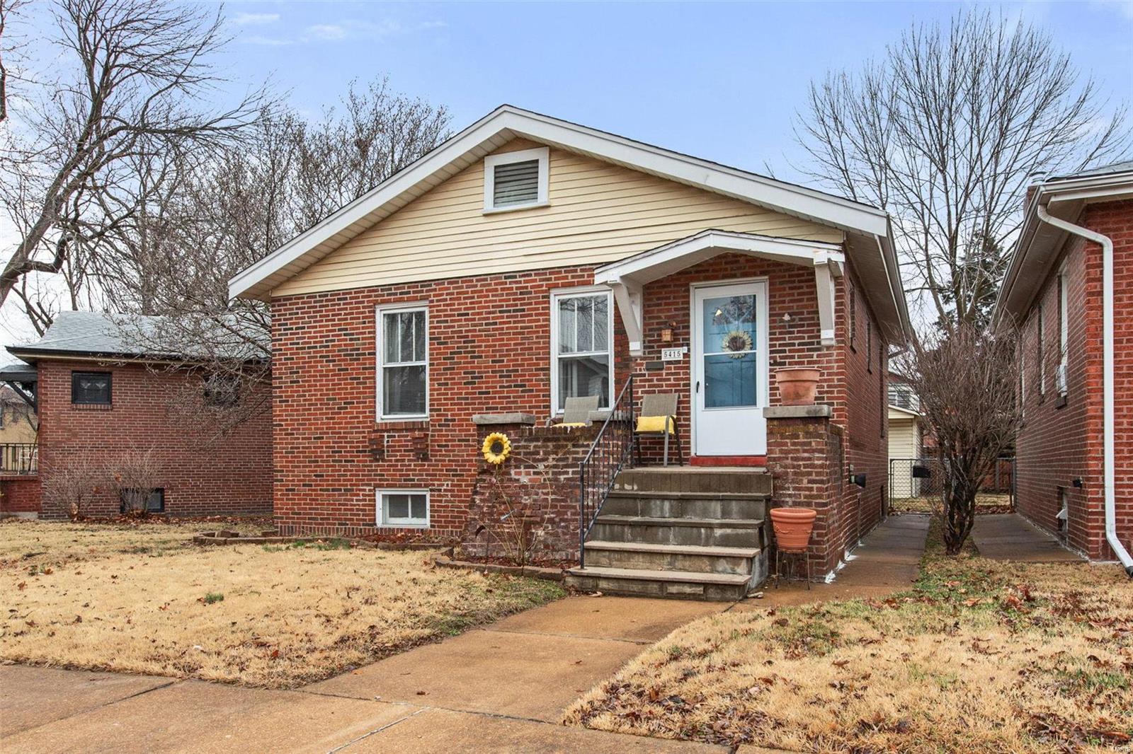 Welcome to 5415 Quincy! This darling brick bungalow sits on a quiet street in the sought after Princeton Heights neighborhood. The interior is loaded with charm and natural light, with an open concept living and dining space complete with fireplace and hardwood floors. The kitchen has granite countertops, gas stove, and a good layout for easy prep while cooking. The hallway leads to a full bath with shower/tub combo, and then into the spacious primary bedroom. The basement is partially finished, with new carpet and ample space for a family/media room or additional sleeping area. Laundry room (washer and dryer stay), full bathroom with shower, and additional storage space round out the walk-out basement. Off the kitchen is a multi-purpose sunroom, currently being used as a mudroom and office. Yard is fully fenced in, and the HUGE garage (30x24) offers plenty of space for 2 cars and a workshop area--a rare find in the city! Don't miss out on this gem! Seller prefers an As-Is sale. Additional Rooms: Mud Room, Sun Room