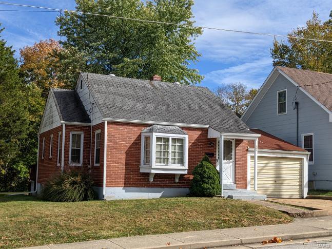Why pay rent,  Take a look at this Brick home situated on .23 acre level lot.  Close to Schools, City Park, Swimming pool and easy access to Hwy 47.
Wood floors in the Living room and Bedroom,  
Bay window in the Front room,
Property is being sold "AS IS" Seller recommends the buyer obtain any inspections they deem necessary to their satisfaction and Cost. The carport was enclosed prior to the seller purchase.  Carport is on the property line.



Please use caution when you go to the basement, steps are very steep.  Please use the handrail.
Do not release the handle on the garage door when you open it.  The garage door springs are stiff and may open too fast if you don’t have control of the door