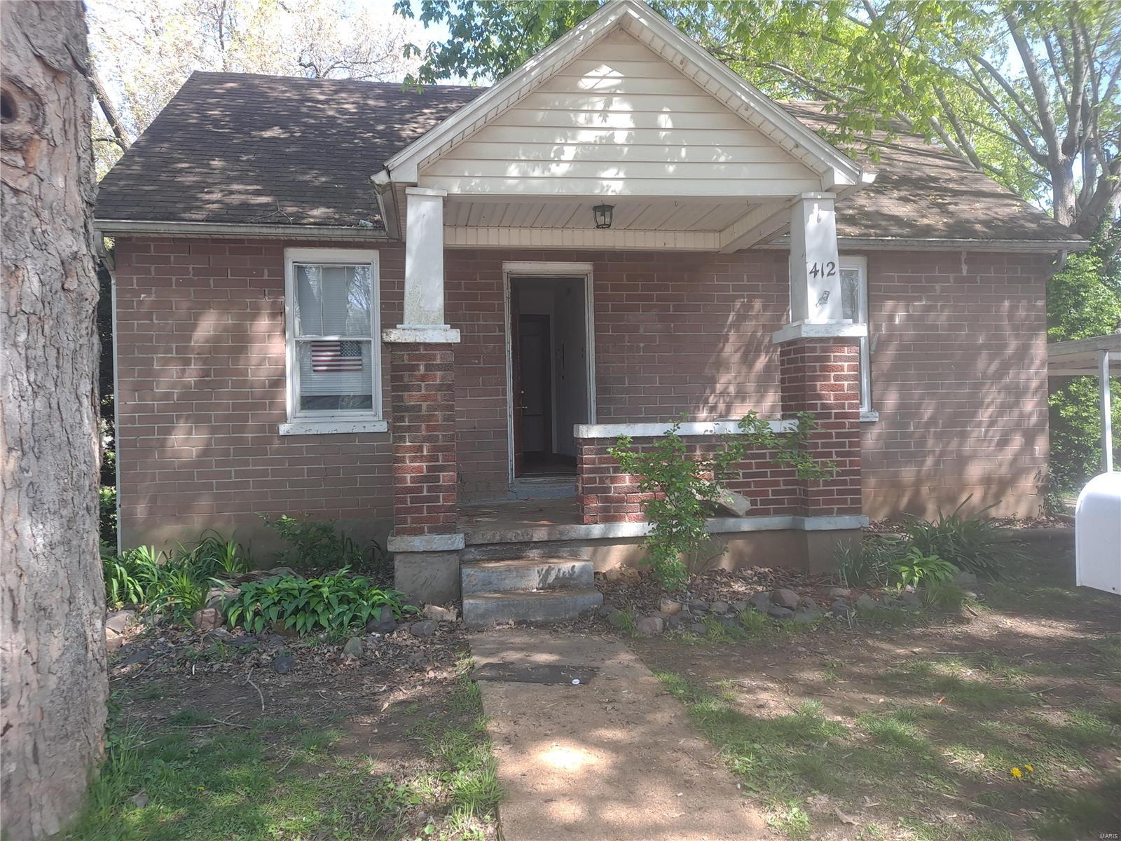 Handyman special has 3 bedroom potential!
