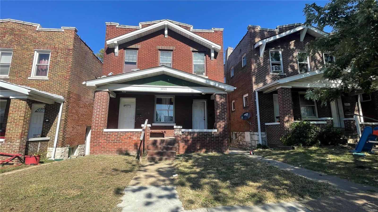 Fantastic opportunity for investors to own this fully occupied 2 family in the heart of Tower Grove South. Each unit in this 2-family building offers spacious living room, 2 bedrooms, a kitchen, and a bathroom.  The property boasts hardwood floors, partially updated plumbing work, 2 circuit breakers, and 6-panel doors.  The large & full walk-out basement offers great storage spaces. Spacious leveled yard with 2 parking pads in the rear. Refrigerators & stoves/ranges belong to the Sellers. Window units belong to tenants. This property is in a desirable neighborhood. Fully occupied and tenants are month-to-month. Enjoy being just a short jaunt from Tower Grove Park, and all the Morganford plus South Grand action! Come and check this one out! Home to be sold AS IS sale. The seller will not provide any repairs/inspections. Pricing is reflexing on the building's condition. CASH sale ONLY and proof of fund is required before showing. Showings are available 8 am-9:30 Mon-Sat. Sunday anytime.