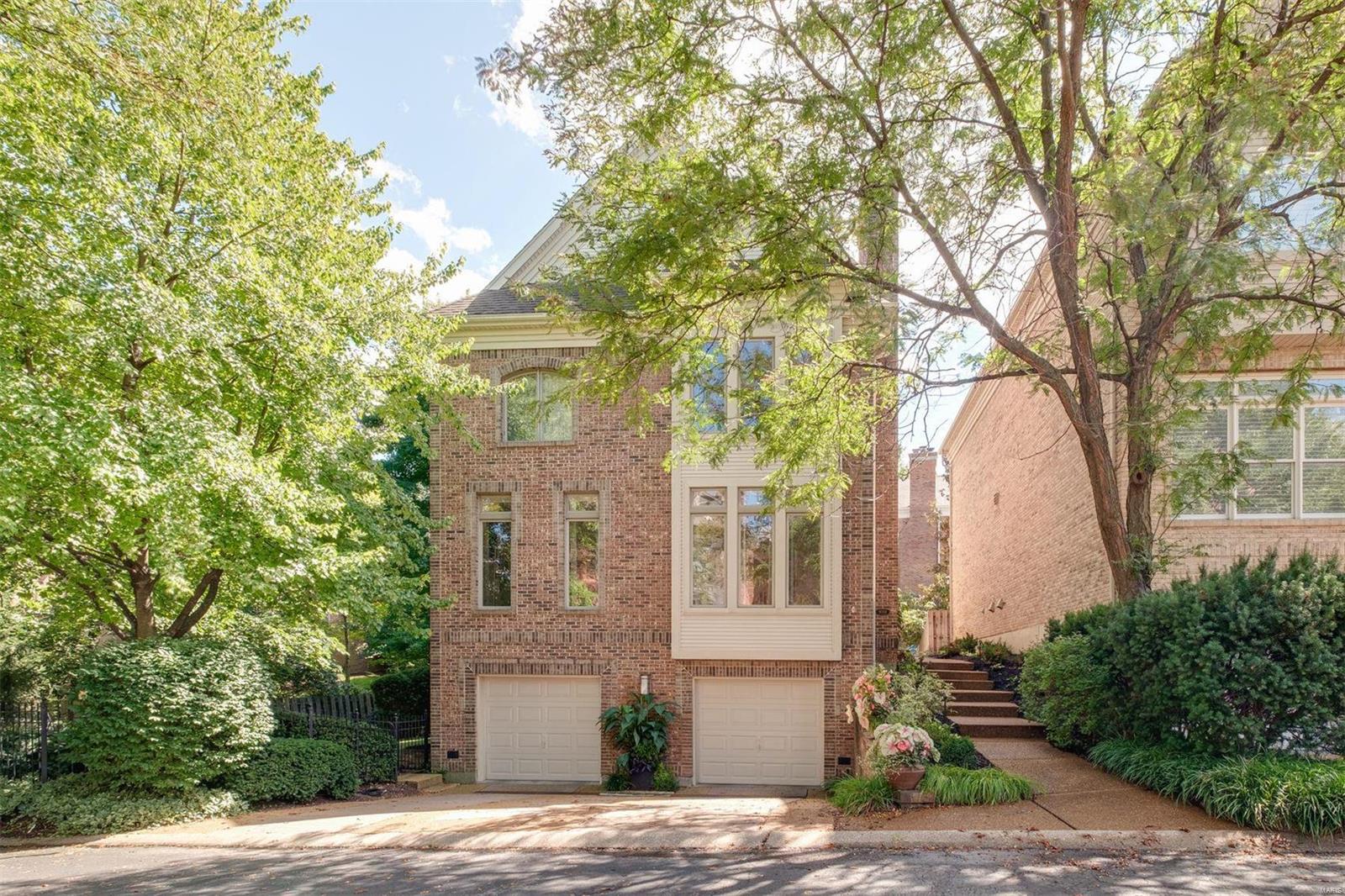 A contemporary builders' home with upgraded finishes resides at the end of a quaint private lane w/in walking distance of lively downtown Clayton. An open & light-filled double foyer w/ a skylight leads into dining rm & adjacent library w/ blt-ins, recessed lights, large windows & h/w floors. Step down into a living room w/ gas f/p & stone hearth. A large eat-in kitchen features high-end appliances, wine cooler, a bonus sink & opens to a family rm w/ gas FP & sliding glass doors that lead to a large wrap-around deck. Upstairs includes an expansive primary suite w/10’ tray ceiling & gas f/p, walk-in closet & bath w/ skylight, jet tub, bidet & shower, as well as a laundry room & 2 more beds w/en-suite baths. An office w/ blt-ins, full bath, 2nd laundry rm & an oversized 2-car garage complete the walk-out lower level. A unique property nestled among greenery & a freshly landscaped setting in the heart of Clayton. Additionally, a fenced-in yard, New Space closets & yard sprinklers.