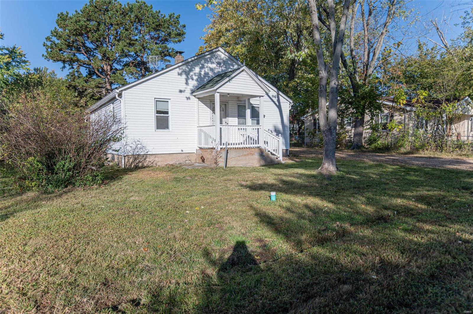 This 2 bedroom 1 bath home is a great starter home or great investment opportunity. This home has an eat-in kitchen and seperate dining area.  There is a large utility room and another room that could be used as a storage area, office or playroom.  The backyard is fenced in and the shed is perfect for gardening and lawn equipment.  Property is located in a quiet neighborhood on dead end street.