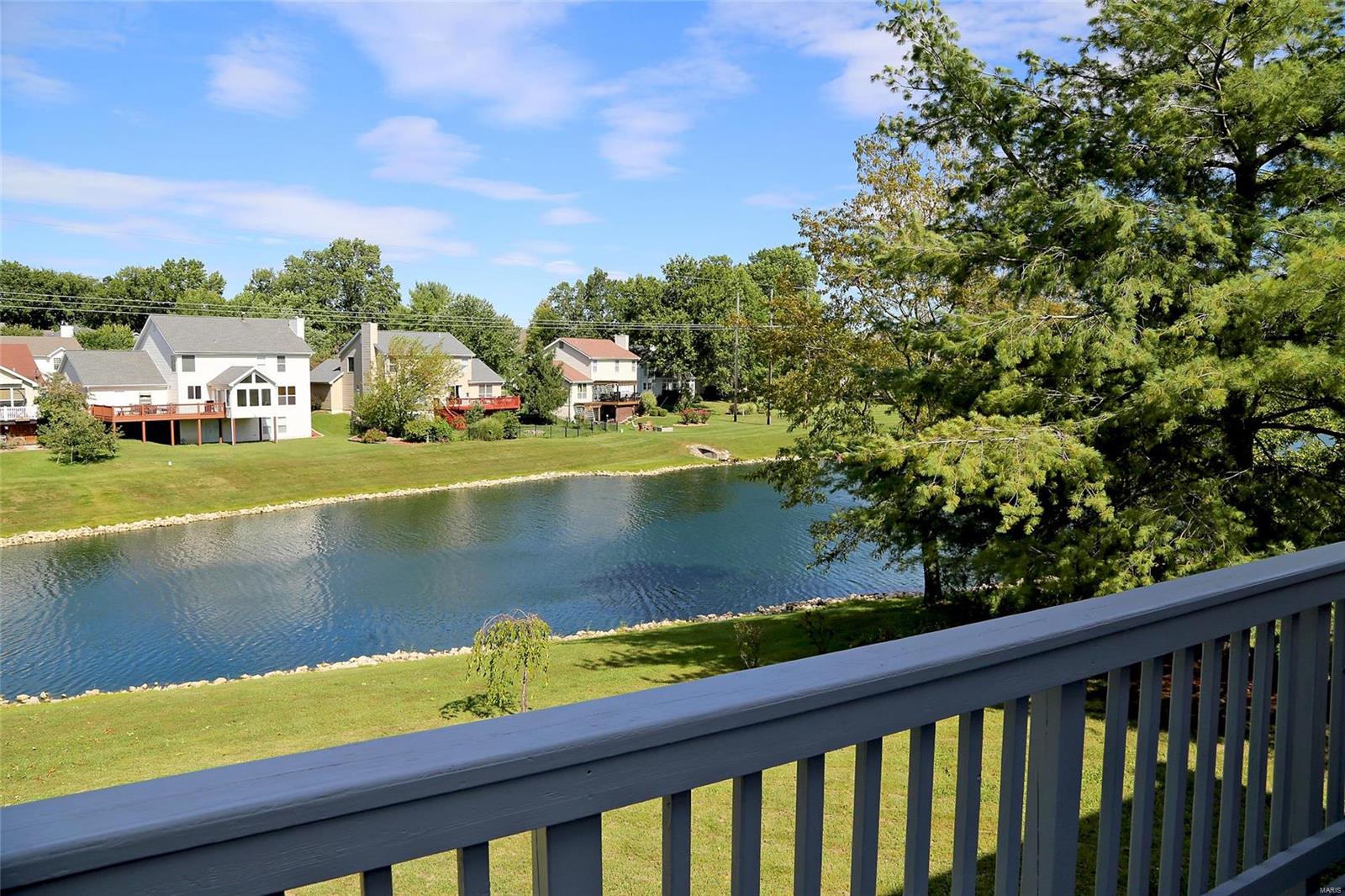 Charming 2 story home Sitting on a nicely landscaped level lot with parklike view backing to lake! Mature trees, large wood deck and the new in 2022 - roof, facia, soffit, gutters complete the outside. Inside offers a comfortable living environment with a woodburning brick fireplace, bay window, fresh paint, main floor laundry & ceiling fans. The huge kitchen has a vaulted ceiling with skylight, center island, pantry, built-in microwave oven & stainless-steel double ovens. The large master bedroom suite has a walk-in closet, double bowl vanity, tub & separate shower. The partially finished walkout basement includes an entertainment area & half bath. Other features include new LVP flooring main level, new carpet second floor, tankless water heater, new windows, high efficiency HVAC & main floor laundry. Also, subdivision clubhouse, club pool and tenis court. The list goes on & on. A great family home is waiting for you in the wonderful neighborhood of Twin Chimneys.