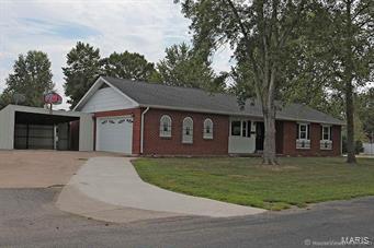 WELCOME HOME !    Lovely  3BR, 2.5BA Brick Ranch in desirable Cloverdale Subdiv   *   Large 1/2 acre double lot (176 x 126) with new 24 x 30 SHOP and wood privacy fence   *   Gorgeous new kitchen with SS appliances & breakfast bar and opens to the living room for today’s lifestyle   *   Furnace & A/C  2012-2013   *   TWO water heaters 2015   *   Newer windows throughout   *   Spacious lower level includes workshop that also doubles as safe room with concrete ceiling and walls   *   Updated electrical panel   *   Covered Patio   *   Side entry two-car garage with additional one-car carport/storage   *   Conveniently located close to schools and easy access to I-55   *  See supplements for complete list of updates and improvements