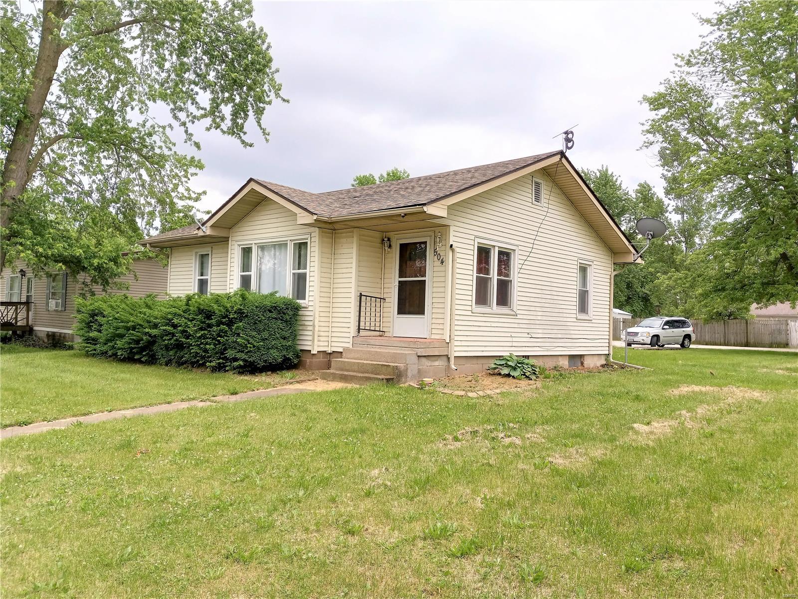 This two bedroom, one bathroom ranch home is located in Madison, MO and offers a large yard and a attached garage. The kitchen will come equipped with the fridge and the electric stove. The washer and dryer will also stay with the sale of the home. The roof has been replaced in 2016 along with the outside A/C unit. Hardwood floors are through out both the bedrooms, living room and the dining room. The large lot offers plenty of space to build a large shop or garage. This property offers a nice investment opportunity as well. The investor could rent out the house and still have plenty of space to build another home on the corner lot to be used for another rental.