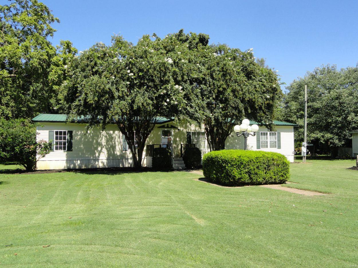 2000 model manufactured home featuring four bedrooms two full bathrooms. The master bath has a garden tub and separate shower. The spacious kitchen is equipped with all newer appliances and plenty of cabinets. The over sized lot is beautifully landscaped complete with privacy fencing around the back yard and a roomy deck ready for barbecuing or outdoor eating. This home is perfect for a growing family and priced to sell.