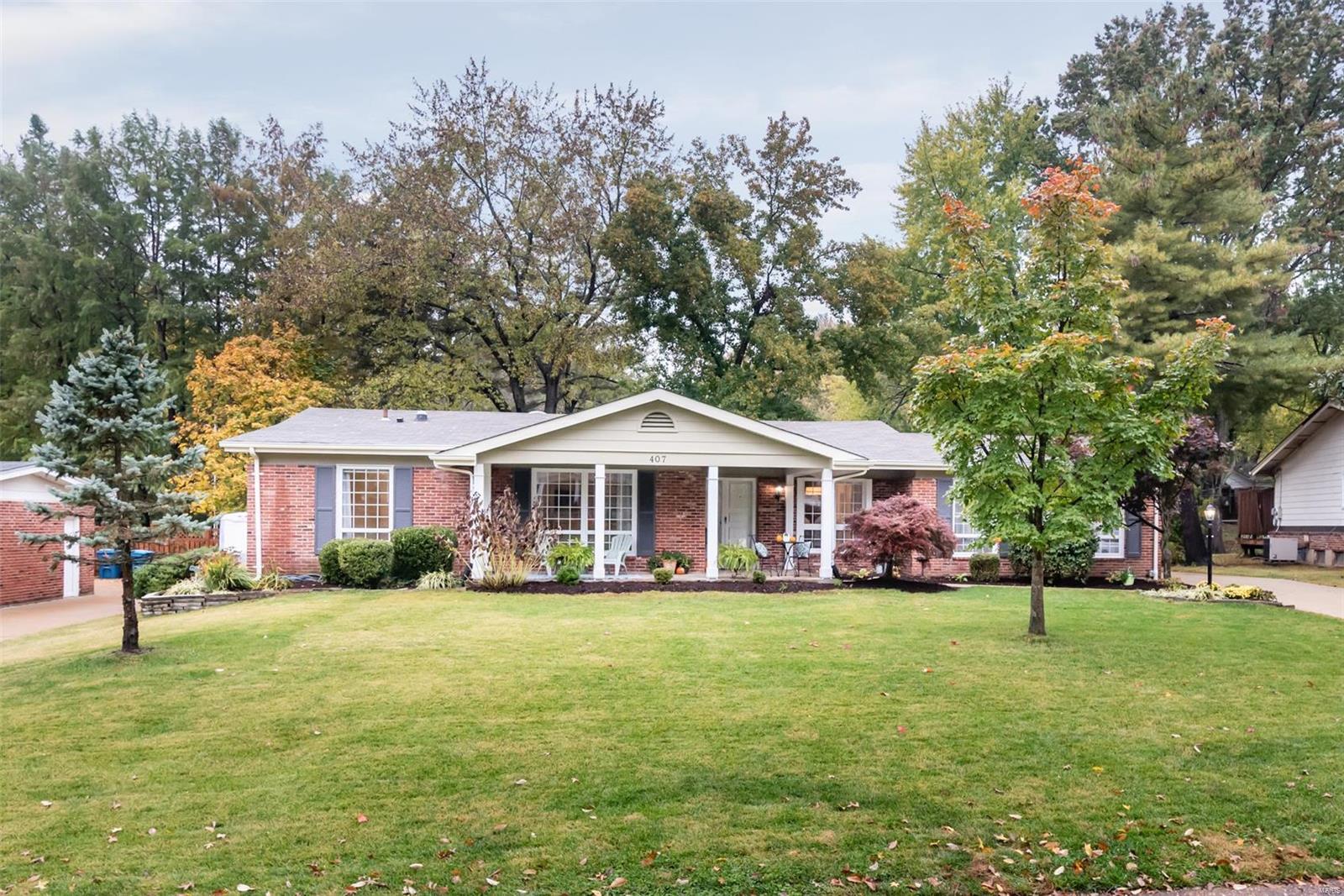 Front porch sitting at its finest. Almost 1/3 acre of a level lot w mature trees, privacy back yard for entertaining, parking pad for a boat or RV. Walking distance to Northpoint pool, tennis courts, and playground. Brick exterior opens to the traditional floor plan formal dining and living rooms hardwood floors, newer window treatments and fixtures. Updated kitchen: white quartz counter tops, SS appliances, island is filled with natural light opens to the great room w vaulted ceilings and wood burning fireplace. Vaulted great room with built in bookshelves. 4 main floor bedrooms all w hardwood and ceiling fans. Enclosable 3 seasons room. Spacious finished basement w/ full bath, updated electrical, and freshly painted. Over 4,000 sq ft of living space.  Located in highly desirable Claymont Subdivision minutes away from 2 Targets and 3 Schnucks.   AC approx. 1 year old, Furnace 4-5 years old updated electrical. Additional Rooms: Sun Room