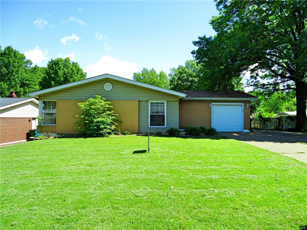 Must see this 4 bedrooms 3 bathrooms large ranch style home  located on corner lot in convenient St Louis  South County. Main floor laundry, entry foyer, wood floors thru big portion of the main level, custom cabinets in kitchen plus ceramic tile floor.  Sliding door in living room leads to composite maintenance free deck. Finished walk out lower level leading to concrete patio and above ground pool. Lower level also features built in bar,  full bathroom, rec room and extra rooms for office or game room. Updates include newer architectural roof, newer windows, 6 panel doors , updated bathrooms, aggregate driveway with extra parking space.  Close to shopping mall and easy access to Hwy 55/255. Home protection plan included.