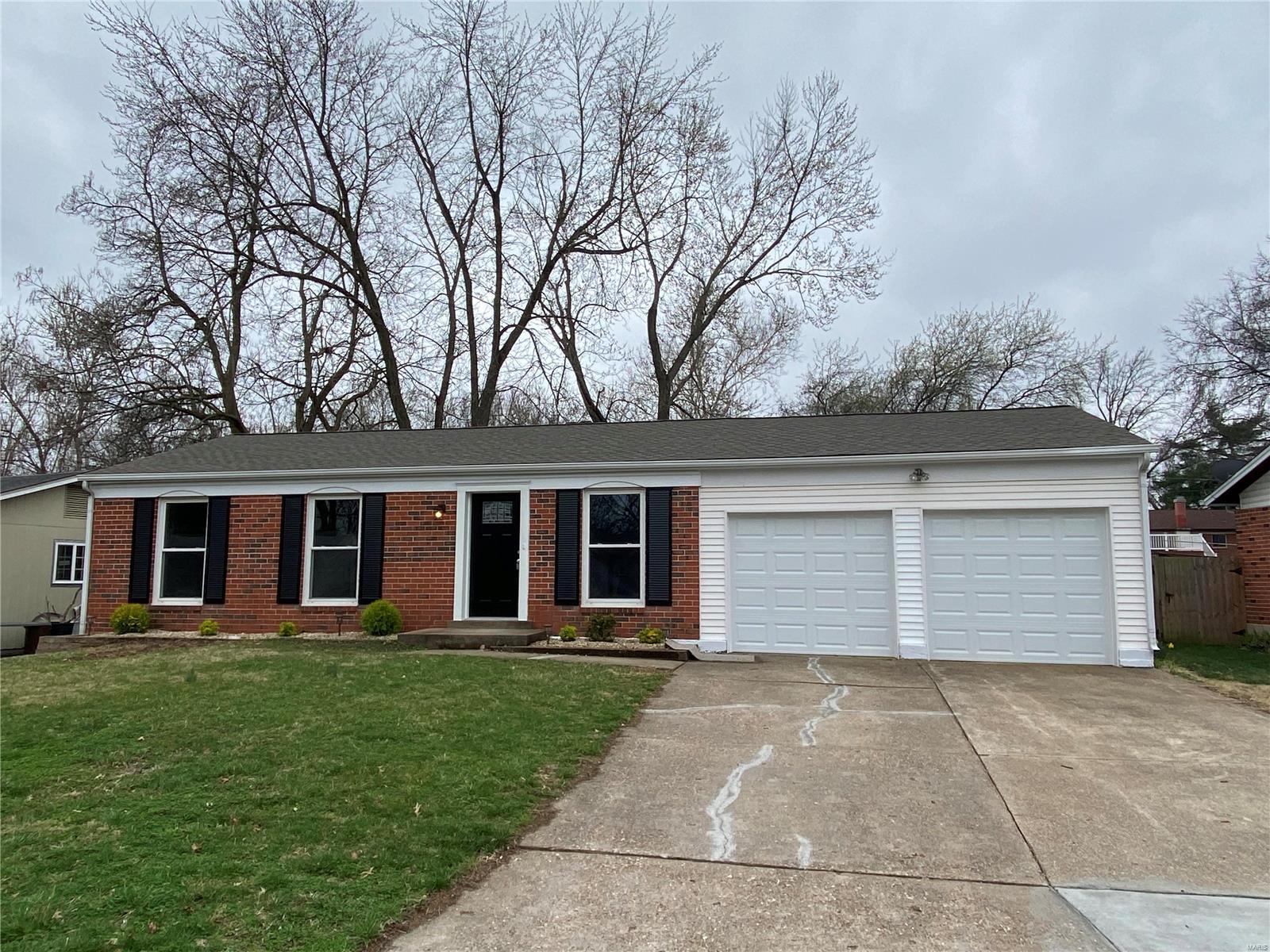 Your going to love this completely updated 3 bedroom brick ranch with finished basement and 2 car garage.  New kitchen with 42" cabinets, granite counter tops, 5 burner gas range and built in microwave.  Bath has new tub, ceramic surround and new vanity.  Fresh paint throughout the interior.  New vinyl plank floors in the living room, kitchen, bath, hall and finished basement.  New carpet in bedrooms.  New furnace, A/C, water heater, electric panel and plumbing stack.  New architectural roof.  2 new garage doors and openers.  All the work is done, just move in and enjoy.