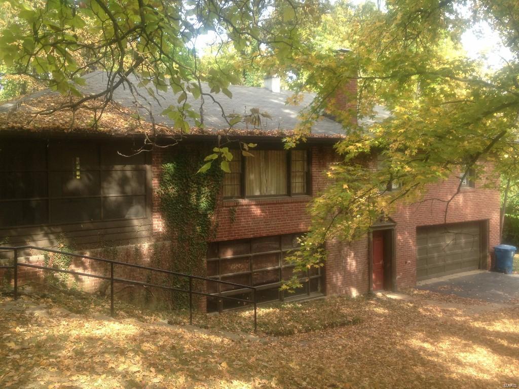 Great opportunity to purchase .89 acre lot in Ladue School District.     Estate property. Personal representatives of estate selling property strictly As Is and will do no repairs.