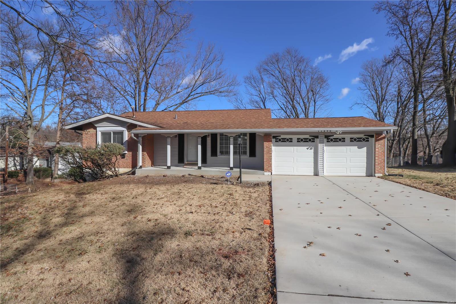 Impressive ranch with updates! Move right in and enjoy this spacious home with open floor plan. Dazzling kitchen with top of the line white cabinets, black granite counter tops, pull out shelves with soft close cabinets and soft close drawers. Under cabinet lighting and glass tile back splash, even has a light that comes on under the kitchen sink cabinet. Two pantries, wood grain ceramic tile flooring, 5-burner gas range, wine and glass rack adds to the appeal of this upscale kitchen. Center hall floor plan has Wood Laminate Bamboo flooring and new carpeting throughout. Stone patio off family room and kitchen with park like views of open ground. Updated bathrooms which include "Shub" disappearing shower doors and popular cabinet and lighting decor. This sprawling ranch has a new driveway, front porch and walk. Home Protection Plan is included.