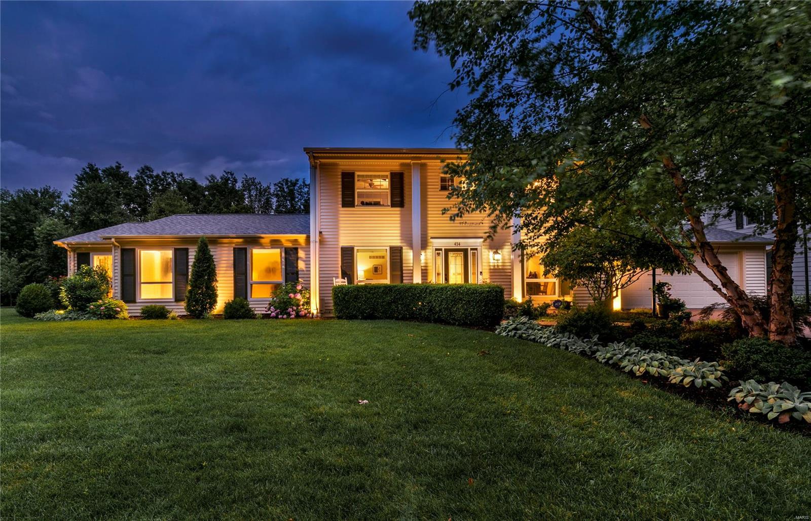 Est. 1973. Picturesque, well-maintained home on a quiet Webster cul de sac. Large, level double lot- walk right across the street to Blackburn Park!  Center hall plan w/ expansive formal Living Room & separate Dining Room.  Updated eat-in kitchen w/ breakfast bar & pantry leads into an incredible Family Room w/ WB fireplace, built-in bookshelves, & bay window, perfect for all of your get-togethers.  The spacious & private updated main floor primary suite w/ walk-in closet is a rare find in Webster Groves.  Main floor laundry.  The screened-in porch w/ cathedral ceiling is the ideal 3 season spot to relax or entertain while overlooking the peaceful backyard. Upstairs find yet another bedroom w/ an attached full bath- an ideal guest suite!  The 2nd floor is rounded out by 3 more bedrooms & another full bath. The large basement can be used as a rec room, storage area, and/or home office.  This home is complete w/ an elevator that services all 3 floors! Zoned HVAC & so many updates!