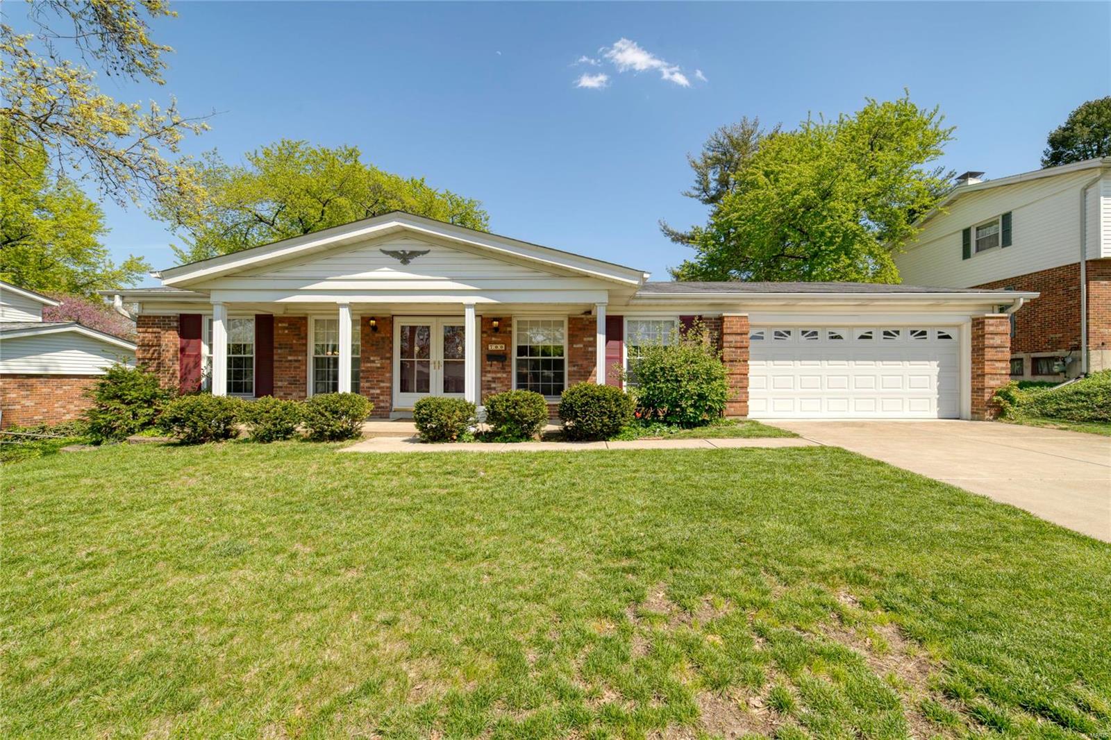 This is an Outstanding 1 Owner Home that Has been Loved and Maintained for many years. This is an All Masonry Home, with 4 Bedrooms/2 Full Baths and Wood Flooring. Your Friends will notice the Beautiful Landscaping & Great Curb Appeal along with the 2 Car Garage/Driveway! They will be welcomed onto to the Covered Front Porch, Double Doors and into the Large Foyer that opens to the Huge Living/Dining Room Combo filled with Natural Light. Walk into the Updated Kitchen & Large Family Room with a Wood Burning Fireplace and New Sliding Pella Door opening to the oversized Patio. There is a Master Bedroom Suite with 3 additional Generously Sized Bedrooms! The Main Floor Laundry makes things easy, also! The windows are insulated, the Roof is Good to Go, Soffits are Vinyl and this is Move In Ready! Also, Did I mention...there is a HOME GAS GENERATOR for when bad weather turns off your lights...Yours stay ON! Unbelievable! Do Not Miss this One of a Kind Home in Beautiful Florissant, Won't Last!