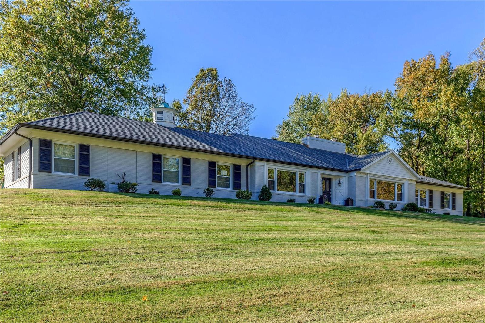 Beautiful RENOVATED home on over 1 acre in one of Town & Country's sought after gated streets-Country Aire. Amazing open floor plan. Chef's kitchen flow into sunroom & hearth room w/soft colors & LOTS of natural light. Hardwood floors flow seamlessly from room to room. Sunroom overlooks the charming in-ground POOL and features its own separate cocktail porch. Master suite is a retreat of its own - with adjoining study/possible nursery & luxurious master bath w/separate tub & shower. HUGE custom walk-in closets. Additional bedroom w/bath rounds out the bedroom landscape on the"west wing". A separate bedroom & bath are situated on the east side of the home & perfect for guests/in-law suite. The 2nd floor bedroom suite is a "loft like bedroom" w/walk-in closet, bath & study/playroom space. Walk-out lower level is awaiting your final touches. Perfect location - inner 270 loop and highway access. Home don't turnover often here! Move-in ready, great price and amazing location!