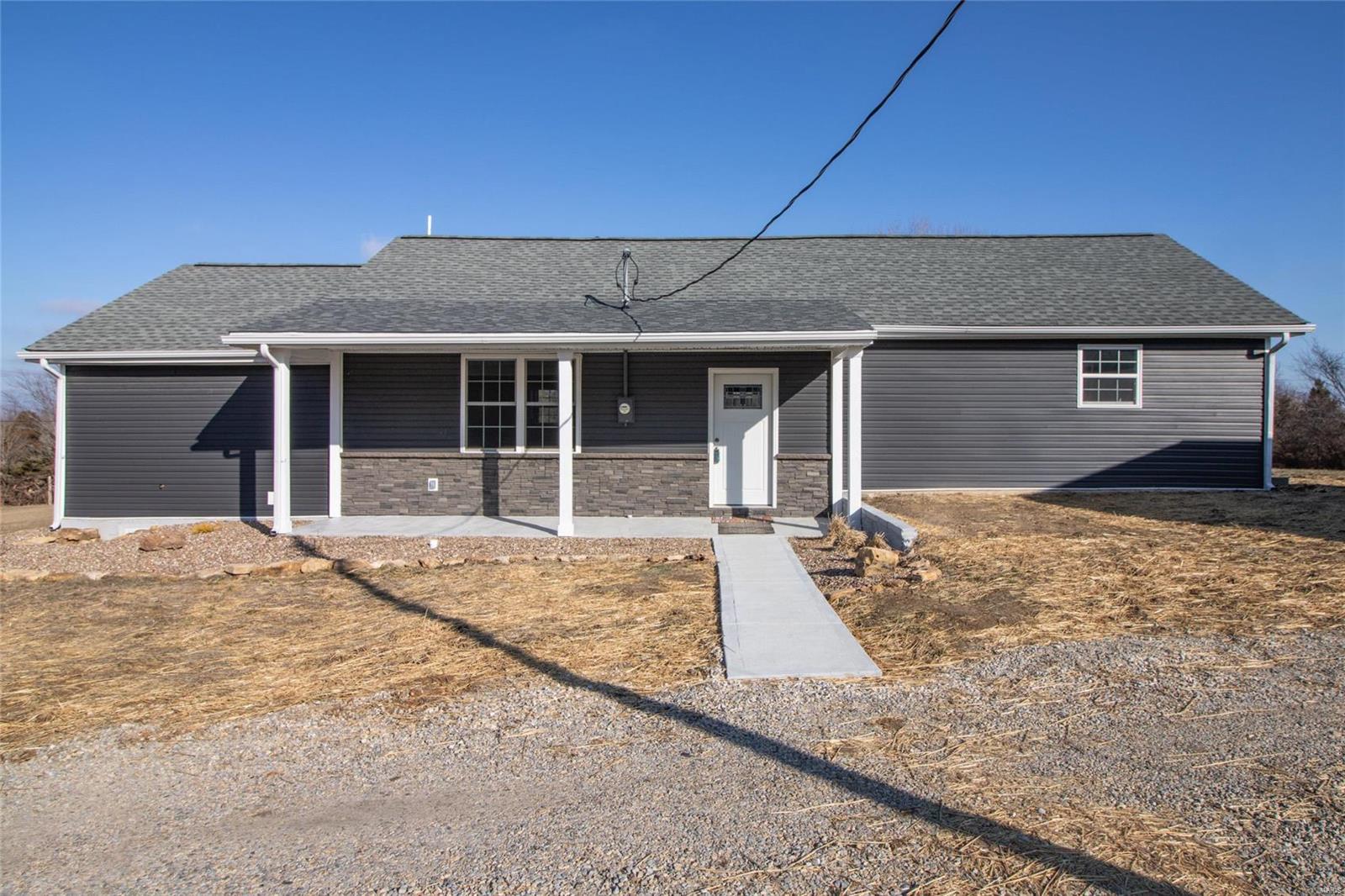 Looking for Modern Farmhouse Charm & an overall SPECTACULAR home w/gorgeous views in DeSoto on 1.68 acres? This beautiful lot is not your everyday find, this property has been completely renovated including updated windows & doors, siding & tastefully updated bathrooms & kitchen! As you walk in you will notice the 9' + ceilings w/ tons of windows to make this home cozy with an enormous amount of sunlight! Beautiful new hardwood floors, kitchen includes shaker cabinets, soft close doors & drawers, cabinet hardware, quartz countertops, gorgeous backsplash & appliances stay.  The bathrooms are absolutely "Show Stopping", including tile flooring & adult height vanities. The master closet is located in the M/Bath w/ a walk-in shower completely tiled from top to bottom. This is the perfect property to catch the sunsets and it already has your dream garage (20 x 40).  This excellent ranch home is waiting for you to make it your own! LaChance Vineyards is just 2 miles away for extra enjoyment.