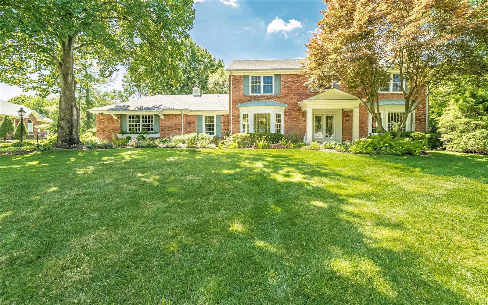 PREDOMINANTLY BRICK home. WONDERFUL PARKLIKE SETTING. BEAUTIFUL LEADED GLASS FRONT DOORS & marble entry. Living & Dining Rms each w 3 window bay & great moldings. Family Rm w glass tile façade fpl to ceiling & 2 sets of French doors to patio & PRIVATE REAR YARD. Kitchen w SILESTONE COUNTERS, FURNITURE STYLE CENTER ISLAND W GRANITE TOP, double ovens, micro, glass cooktop, frig, neat large deep double bowl sink, some glass front cabinets & dbl door pantry. Brkfst Rm also w access to patio. MAIN FLR OFFICE OR BONUS RM. SPECIAL OWNERS RETREAT W CROWN MOLDING, CUSTOM WALK-IN CLST & UPDATED UNIQUE BATH W NEAT DBL BOWL FURNITURE STYLE VANITY W DRAWER STACK, FREE STANDING TUB, PRIVATE WATER CLOSET W CUSTOM WALK-IN SHOWER W GLASS TILES TO CEILING. Additional updates: LL FULL BATH 2017, NEWER PELLA WINDOWS 1st & 2nd, LIGHT FIXTURES, ROOF, VINYL SIDING, SOFFITS, GUTTERS, DRIVEWAY. Additional features: SOME WOOD FLOORS, great moldings, MAIN FLOOR LAUNDRY, oversize RE garage, sprinkler system, HPP.