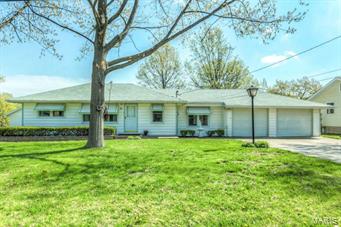 Family home sits on 2 ACRES of land - Add to the existing home or build new on the adjoining lot.  Charming ranch home that has been well cared for and maintained can be yours and you can enjoy the open space surrounding you.  The home offers Living room, dining room, kitchen w/eating space.  A large breezeway/family room adjoins the house and garage for family gatherings.  Two car garage.   Maintenance free exterior with vinyl siding. .  Three Morgan sheds can be used for storage or garage are on a slab and have electricity.  Family bar-b-que can be enjoyed on the back patio with awning roof.  Low utility costs being that the home is total electric.  Roof is only 3 years young; hot water heater is 5 years young.  Call today to view this great investment.  Home is on septic - Sewer connection is at the street.