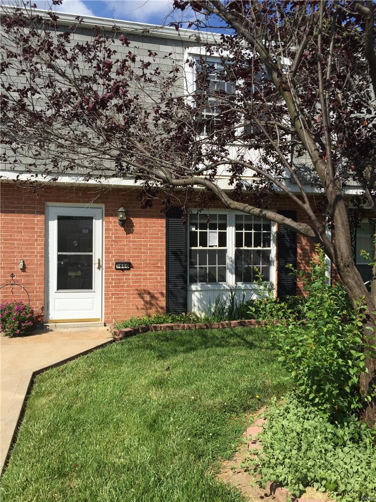 Stunning ground floor level town house.  This cute two story features a large living room, separate dining area that sits just off the kitchen.  Newer wood veneer flooring in the kitchen.  Breakfast bar, all appliances, including washer and dryer on the main floor, in addition a half bath is on the main level.  Walk up the neutrally decorated staircase to three large bedrooms and a full bath.  Master bedroom features walk in closet and built in vanity.  The back yard has a vinyl fenced in patio area offering that additional privacy you may want.  Home is within walking distance to public transportation, restaurants, shopping, and more.  Check this charmer out before it's gone! SpecialListingConditions: Foreclosure Location: Ground Level
