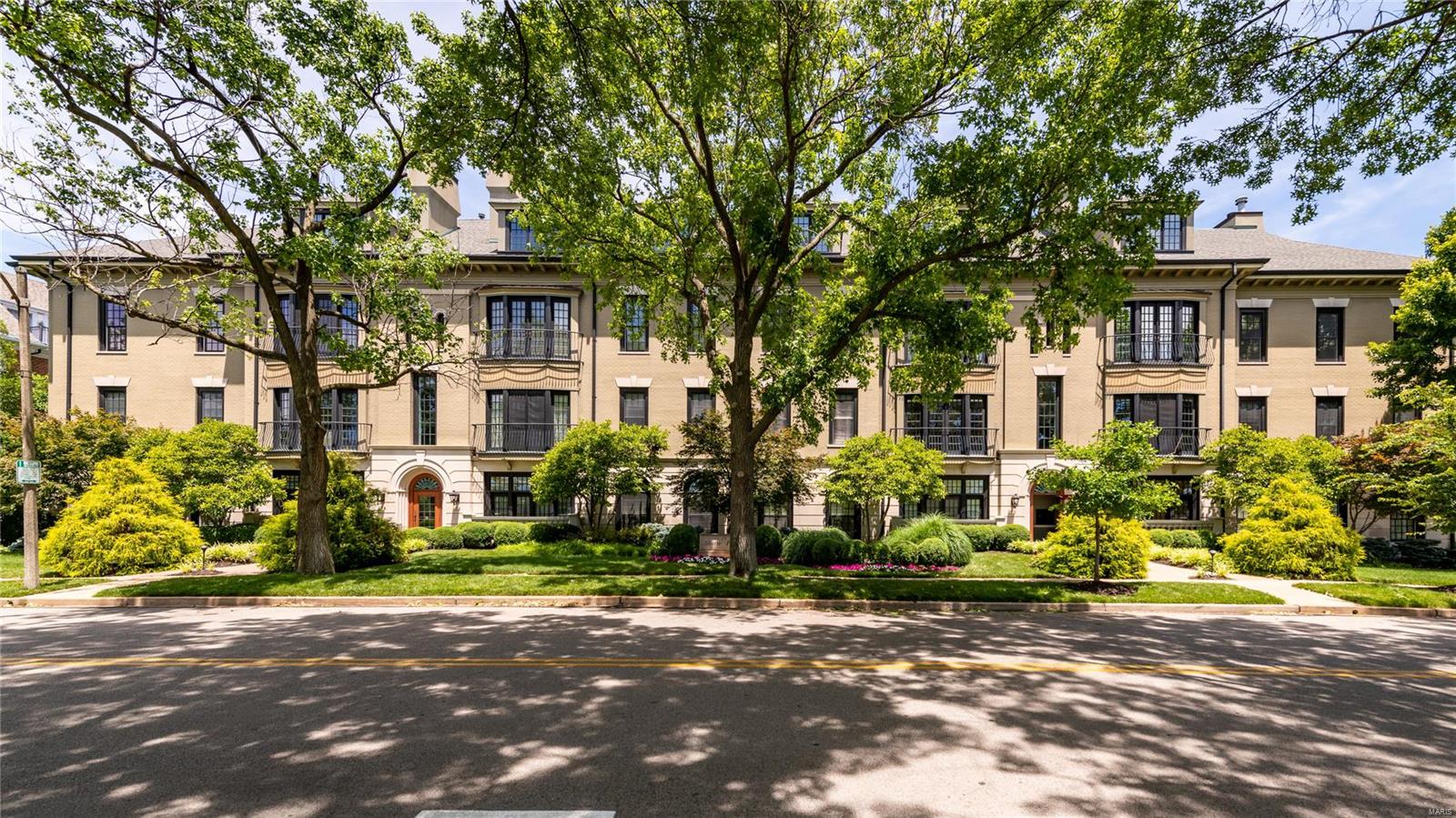 Stunning 3,856 sq ft penthouse in highly desirable building in a vibrant Clayton location. An elevator opens to your private vestibule which seamlessly flows to an impressive foyer highlighted by a marble floor and large skylight. The 10’ ceilings, exquisite finishes and masterful millwork can be found throughout. A large living room w/gas fireplace and wall of French doors/windows leads to one of the 3 inviting private terraces. The space adjoins a family room w/wall of built-ins and gracious dining room w/coffered ceiling. The custom chef’s kitchen/breakfast room offers high profile appliances, quartz counters, access to a 2nd terrace from atrium door/wall of windows plus convenient private back elevator. A lavish primary suite boasts of a gas fireplace, walk-in closet, access to 3rd terrace and amazing dual bathrooms w/pass-thru shower between. Two more bedrooms w/Jack-n-Jill bath, private laundry room, guest bath plus abundant in-unit storage. Luxury living w/Shaw Park steps away! Location: End Unit, Upper Level