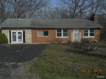 Attention Bargain Hunters! What a great deal on this spacious home and 2 lots. It features 2 bedrooms, charming fireplace, deck and so much more it is a must see. The subject consists of 3 parcels, a single family home on .78 Acres, a vacant lot directly west of single family and across a gravel road is a .43 acre plot that currently has a mobile home attached (this will be sold as land only). SpecialListingConditions: Foreclosure