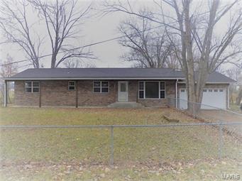 Don't miss your chance to purchase this Beautiful Ranch style Home. Walk inside to calming colors in every room, lots of large windows to allow natural light to shine in on the Walnut/Cherry Hardwood Floors, Bathrooms have beautiful textured  Ceramic Tile. Open Basement with many windows letting in light, NEW QUAKER Windows throughout house, NEW stainless Appliances, NEW Water Heater, NEW 2017 HV/AC  Heat Pump/ Furnace, NEW Roof and Gutters.... 3 bedroom 2 bath laundry room full basement 2 car garage, fenced yard 3 miles from town...backyard view of horses grazing in pasture across the road  and neighboring pond.